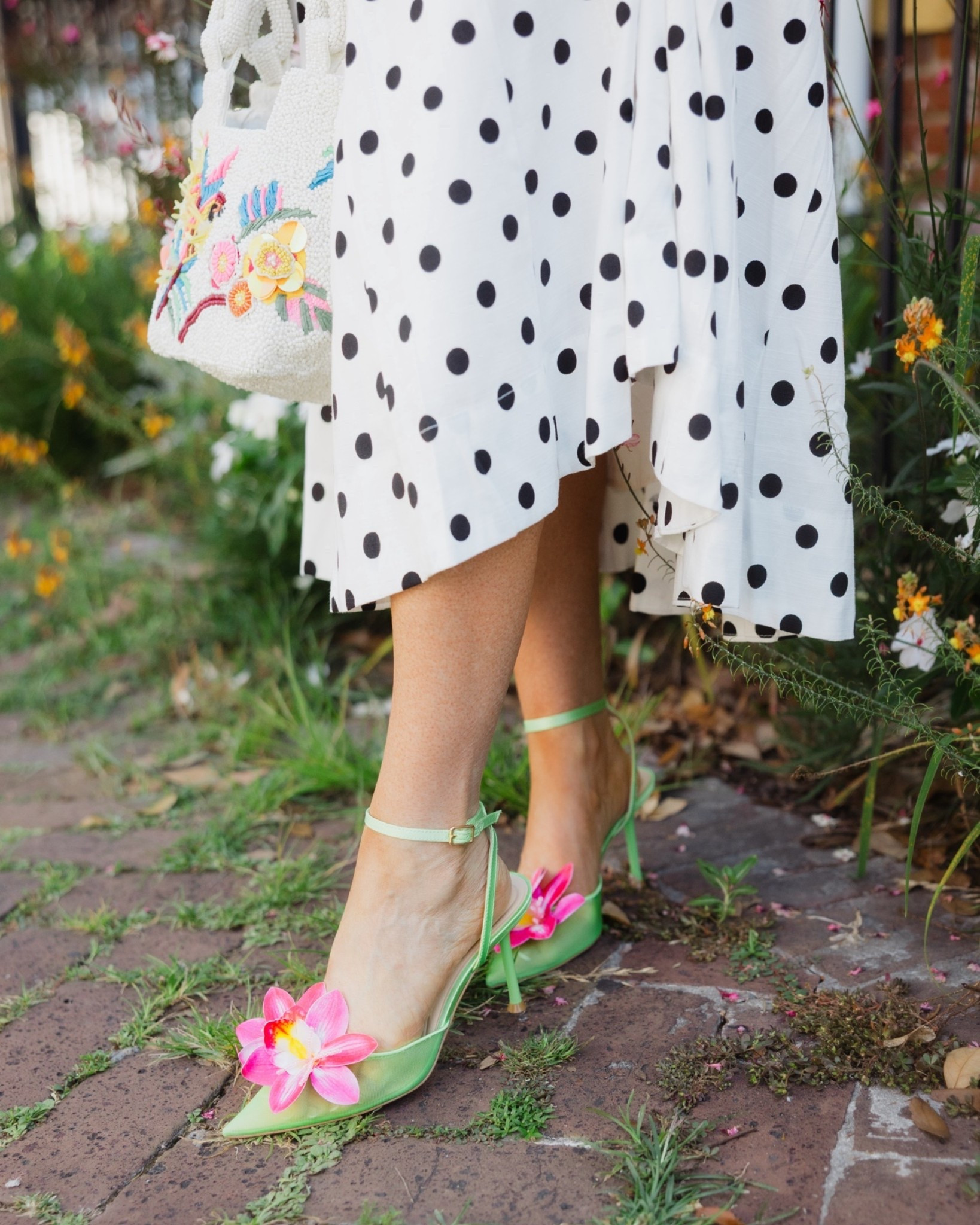 Fun polka dots deserve fun shoes! 🌸💐

Spring outfits 2026, summer outfits 2026, black and white polka dot midi skirt, corset top, date night outfits

#LTKdayinmylife #LTKootd #LTKSeasonal