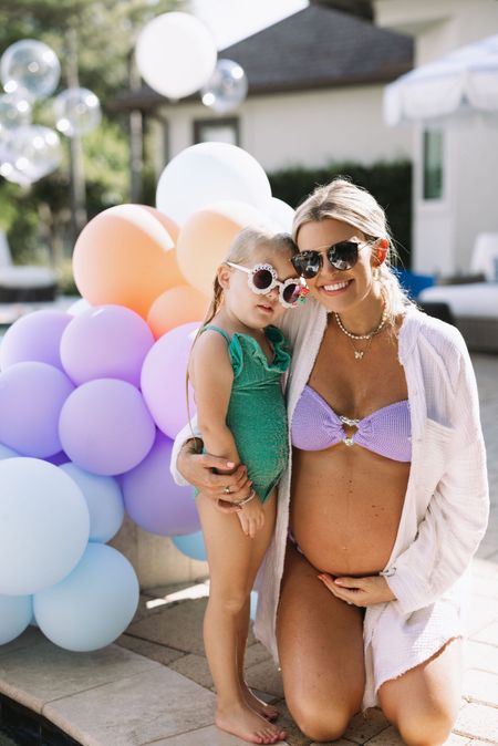 What we wore for Brynnie’s mermaid party! She loved her mermaid swimsuit and I found the cutest bump-friendly bikini to fit the color palette 🫶🏼 

Mermaid party, mermaid themed birthday, toddler birthday party ideas, mermaid outfits, toddler mermaid dress 

#LTKswim #LTKfamily #LTKkids