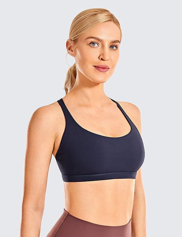 CRZ YOGA Strappy Sports Bras for Women - Criss Cross Back Sexy Wireless Padded Yoga Bra Cute Workout | Amazon (US)