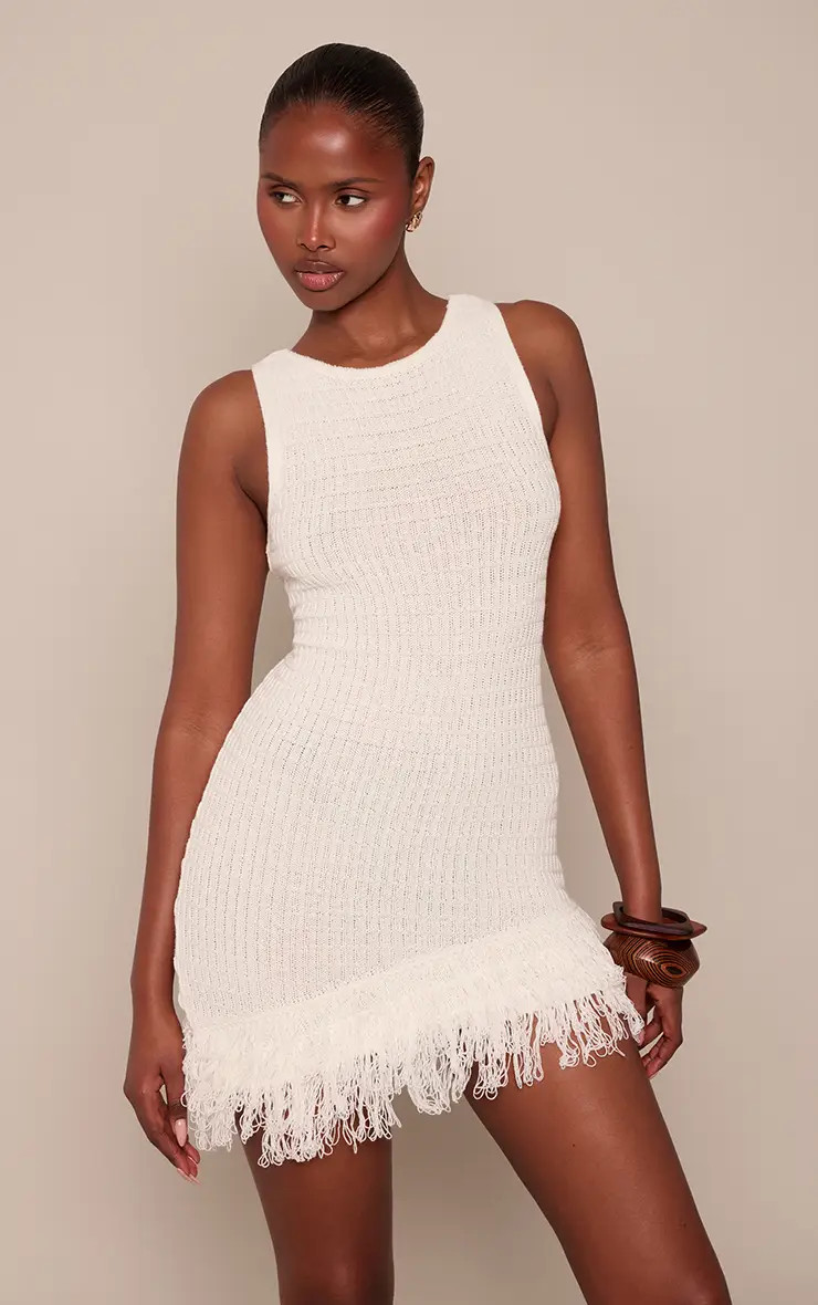 Cream Racer Neck Loop Knit Fringe Hem Asymmetric Mini Dress | PrettyLittleThing US