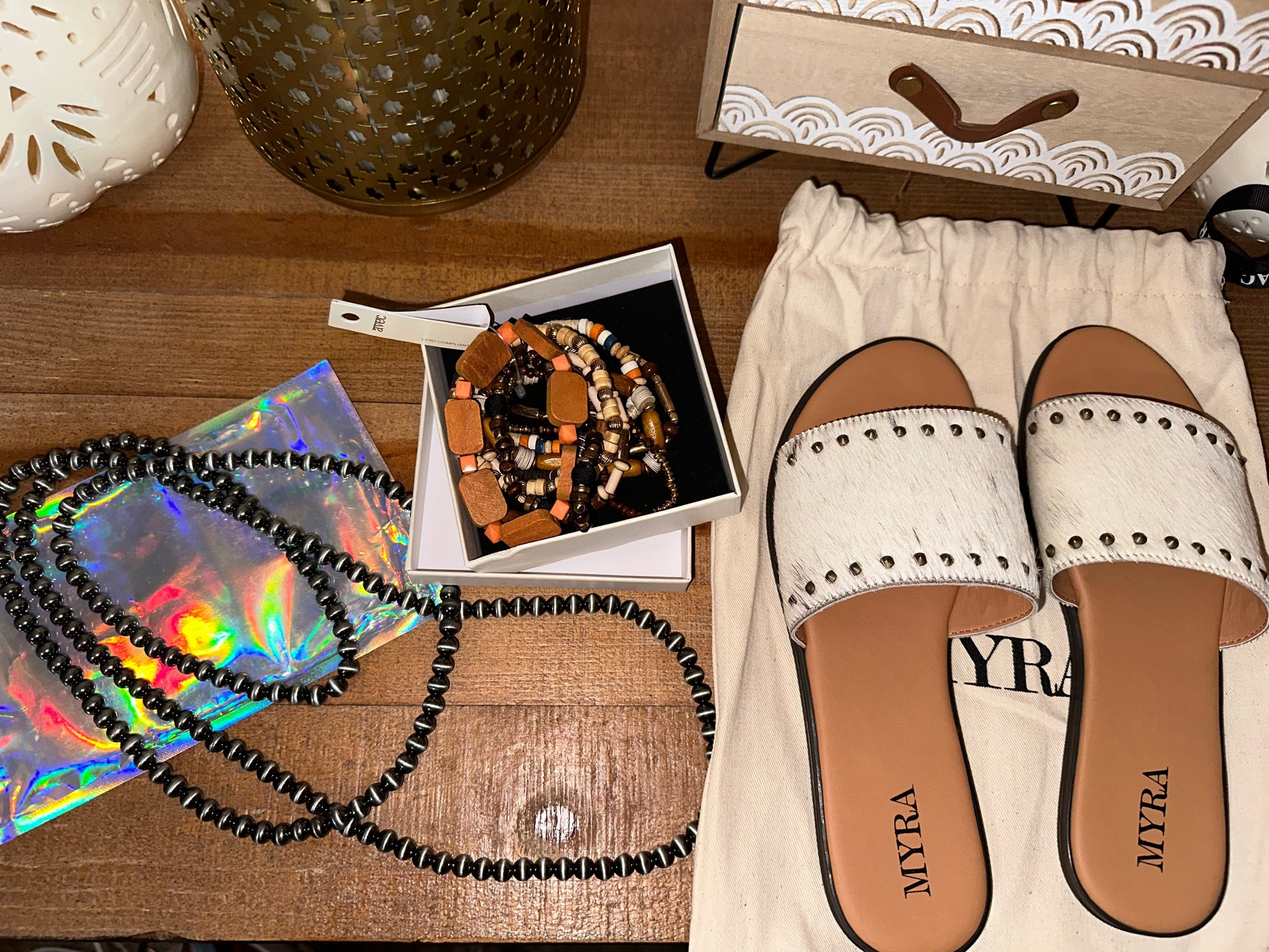 Cowhide sandals, faux Navajo pearls, Amazon jewelry 

#LTKGiftGuide #LTKstyletip #LTKshoecrush