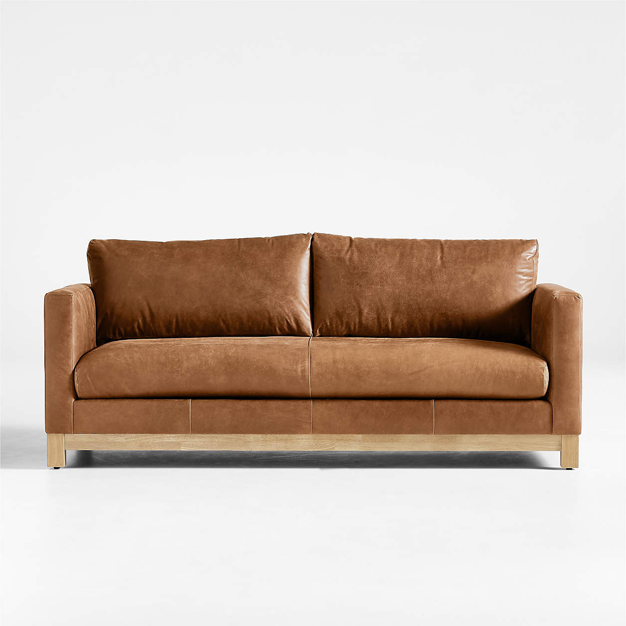 Pacific Wood Base 80" Leather Bench Sofa + Reviews | Crate & Barrel | Crate & Barrel