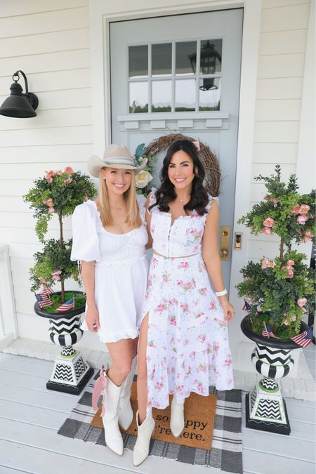 Our outfits of the night to the Kenny  Chesney concert! Wearing size medium in my dress. Country concert outfits // cowboy boots // western boots // country concert dresses 

#LTKParties #LTKFestival #LTKSeasonal