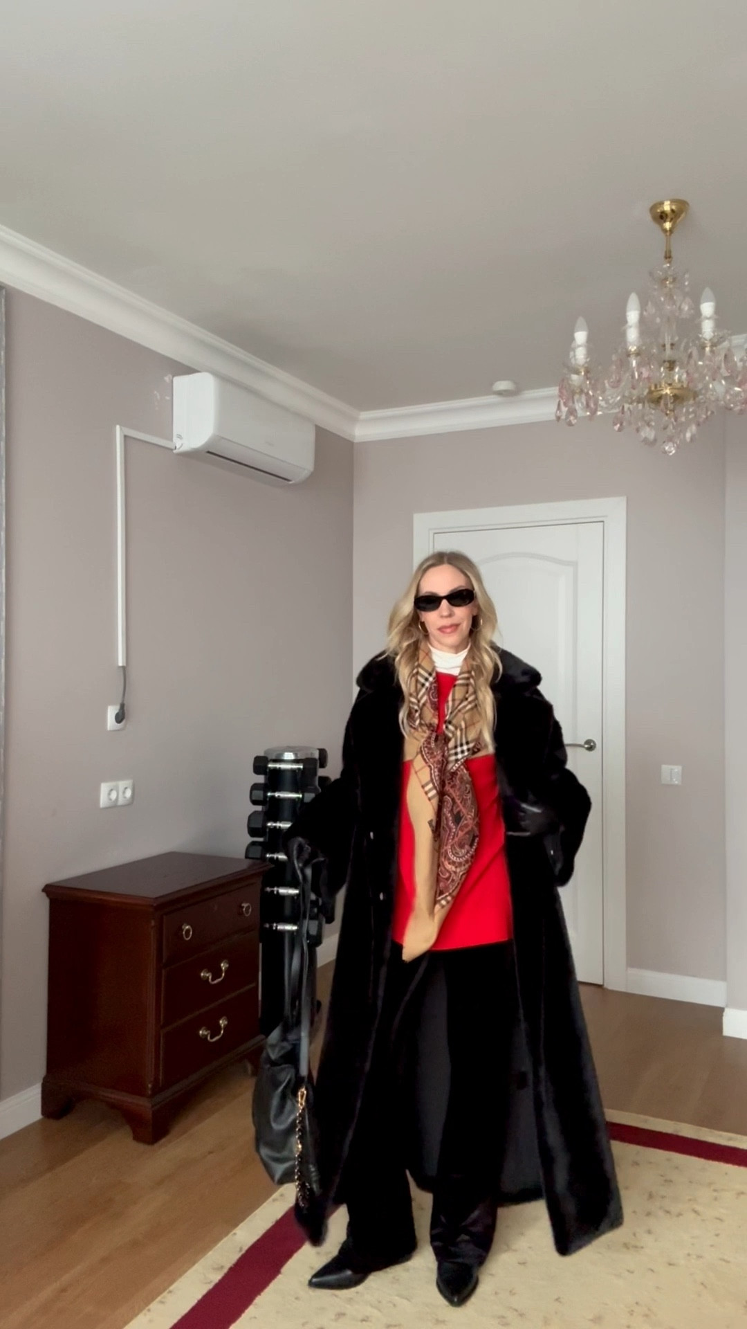 Holiday festive outfit, Christmas concert look, black fur coat, red sweater, vintage Burberry scarf, velvet flare leggings, Loewe Flamenco handbag 

#LTKOver40 #LTKootd #LTKHoliday