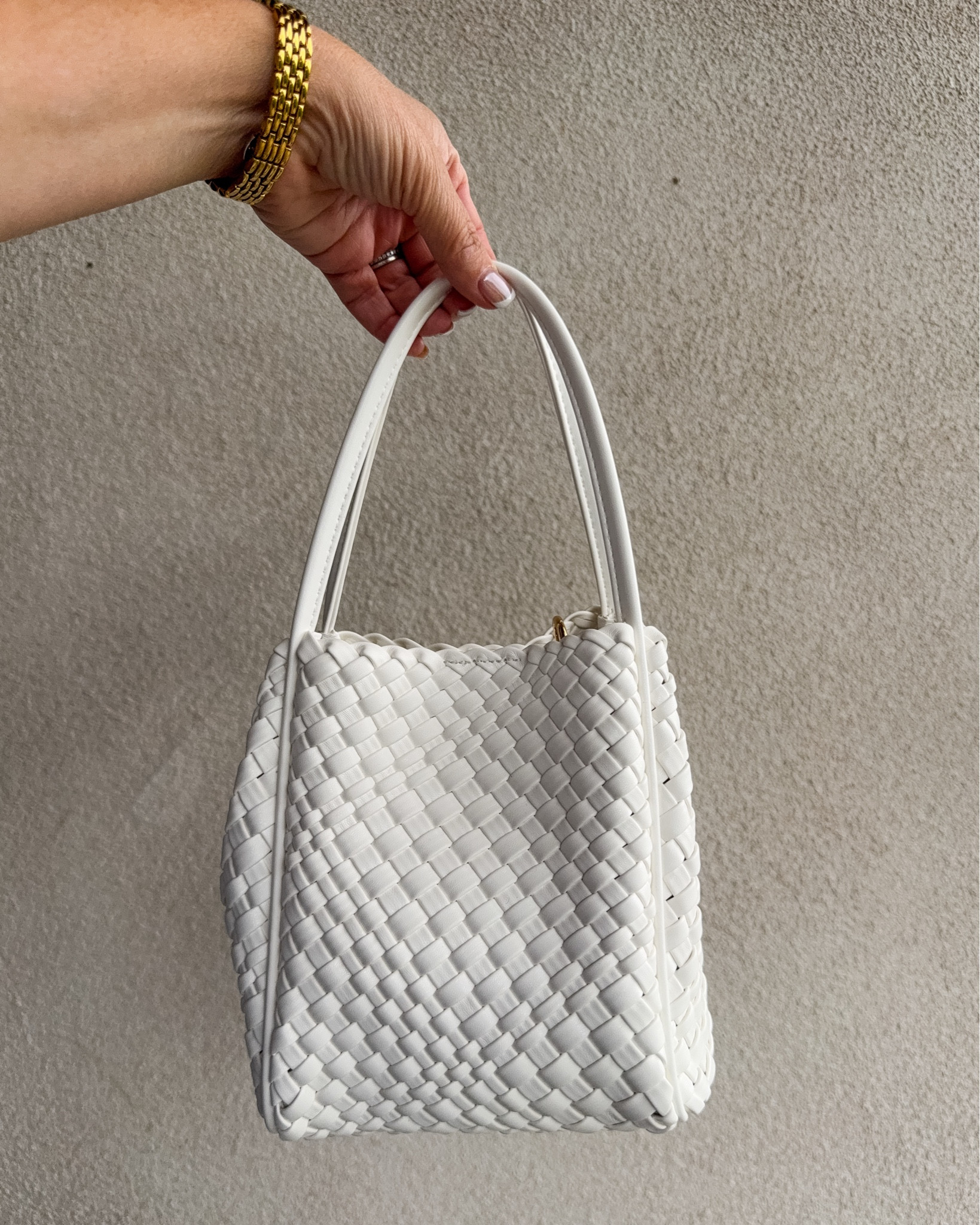 I grabbed the woven white Hollace mini tote for summer to go with summer dresses and it does not disappoint.  It is the perfect summer accessory for a dinner or event to hold your phone and some beauty basics for quick touch ups!  PLUS it comes in TONS of colors!

#LTKootd #LTKSeasonal #LTKTravel