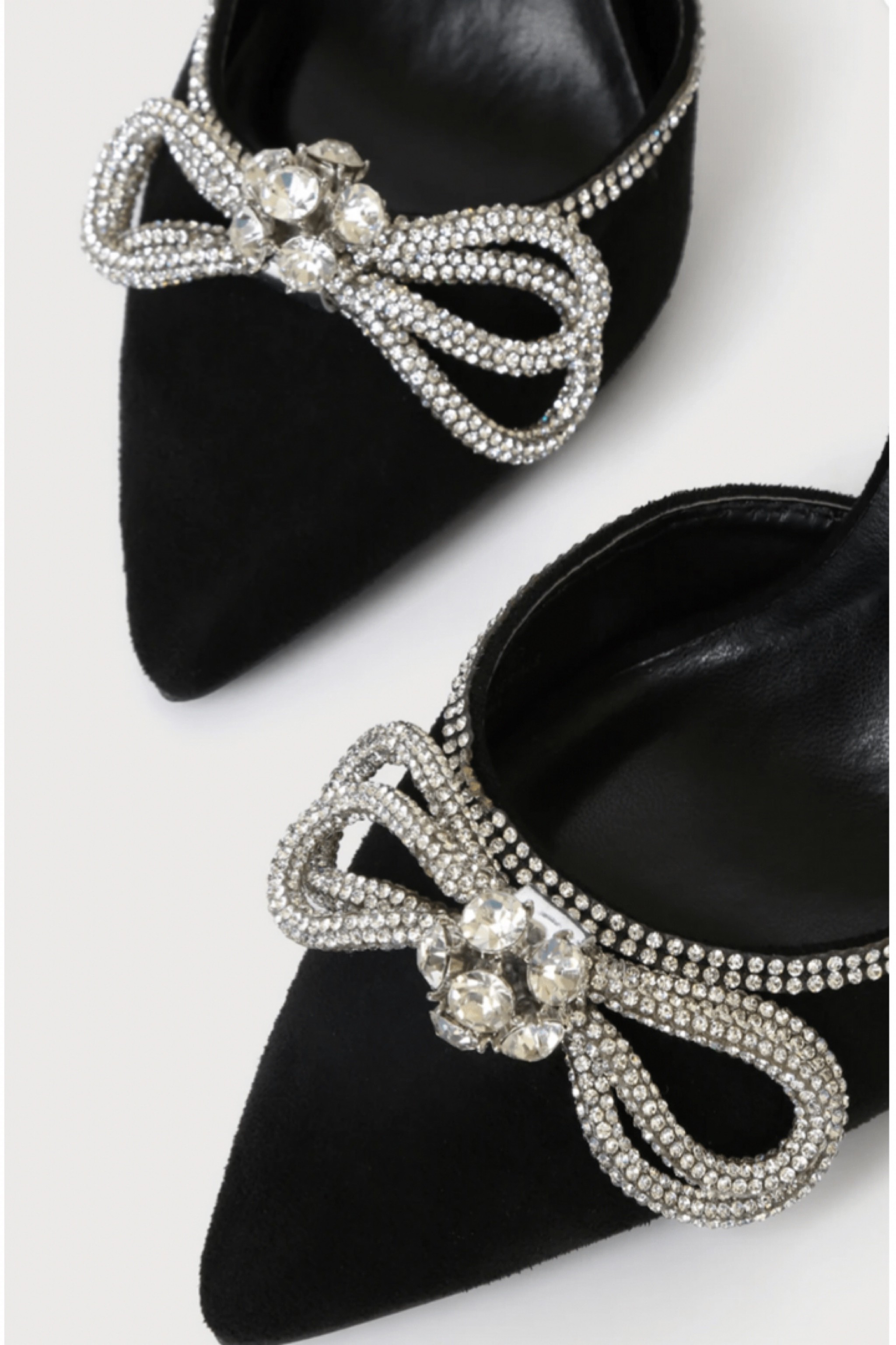Designer dupes for so much less. Grab these beautiful look-a-like heels for so much less than the real Mach & Mach Double Crystal Bow Pointed Toe Heel for $1, 177.00. They match so precisely that it’s amazing. Great Look good for less!! YoumeandLupus, black bow tie heel, bow tie heels, black lace up heels, rhinestone heels, colorful bow heel, rhinestone bows, party footwear, holiday events

#LTKSeasonal #LTKHoliday #LTKstyletip