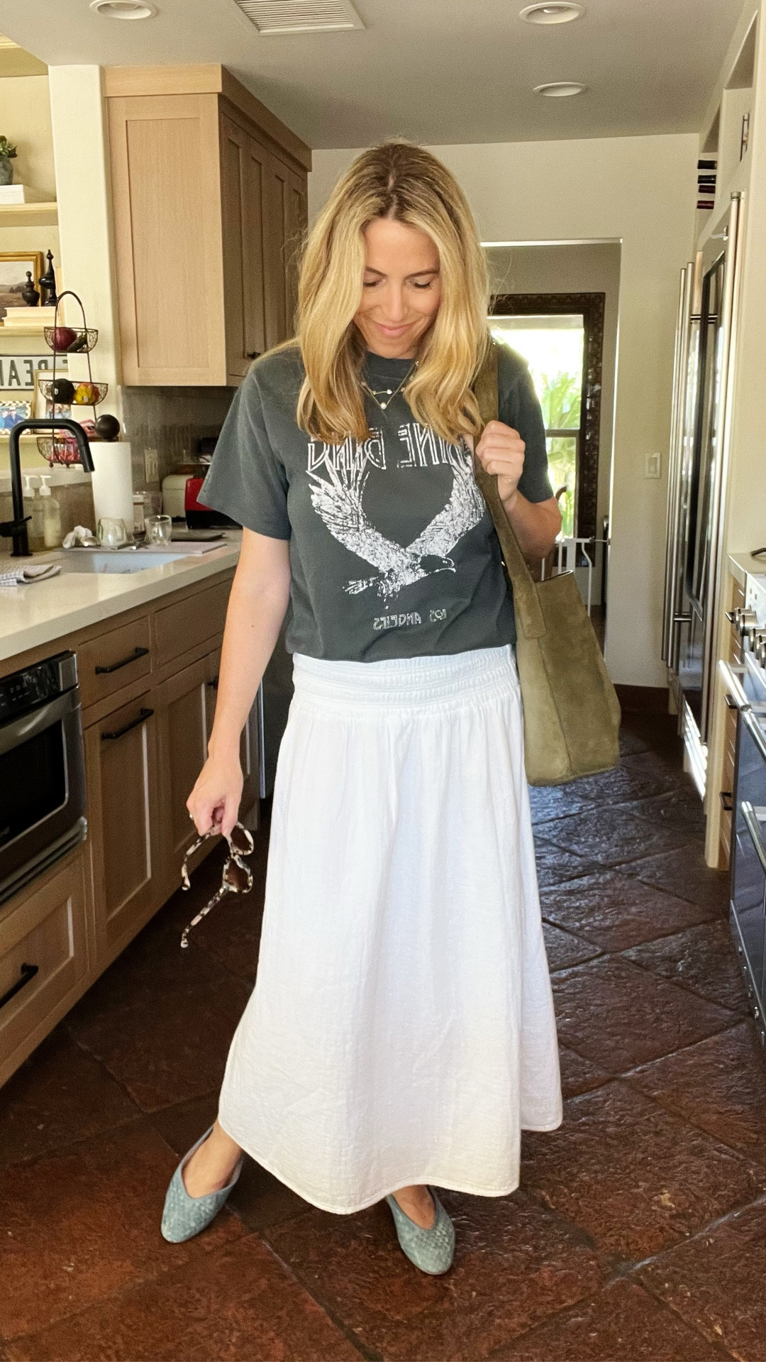 Look of the day

Sometimes you just need to wear a graphic tee! Laura loves pairing a charcoal/black graphic tee with a white skirt and flats for a playful work day look. Anine Bing has such great tees. A little pricey- but they last and are an “elevated” tee sort of look. 

Would you wear this look??

All items tts. Laura in a small. 

#LTKOver40 #LTKShoeCrush #LTKStyleTip