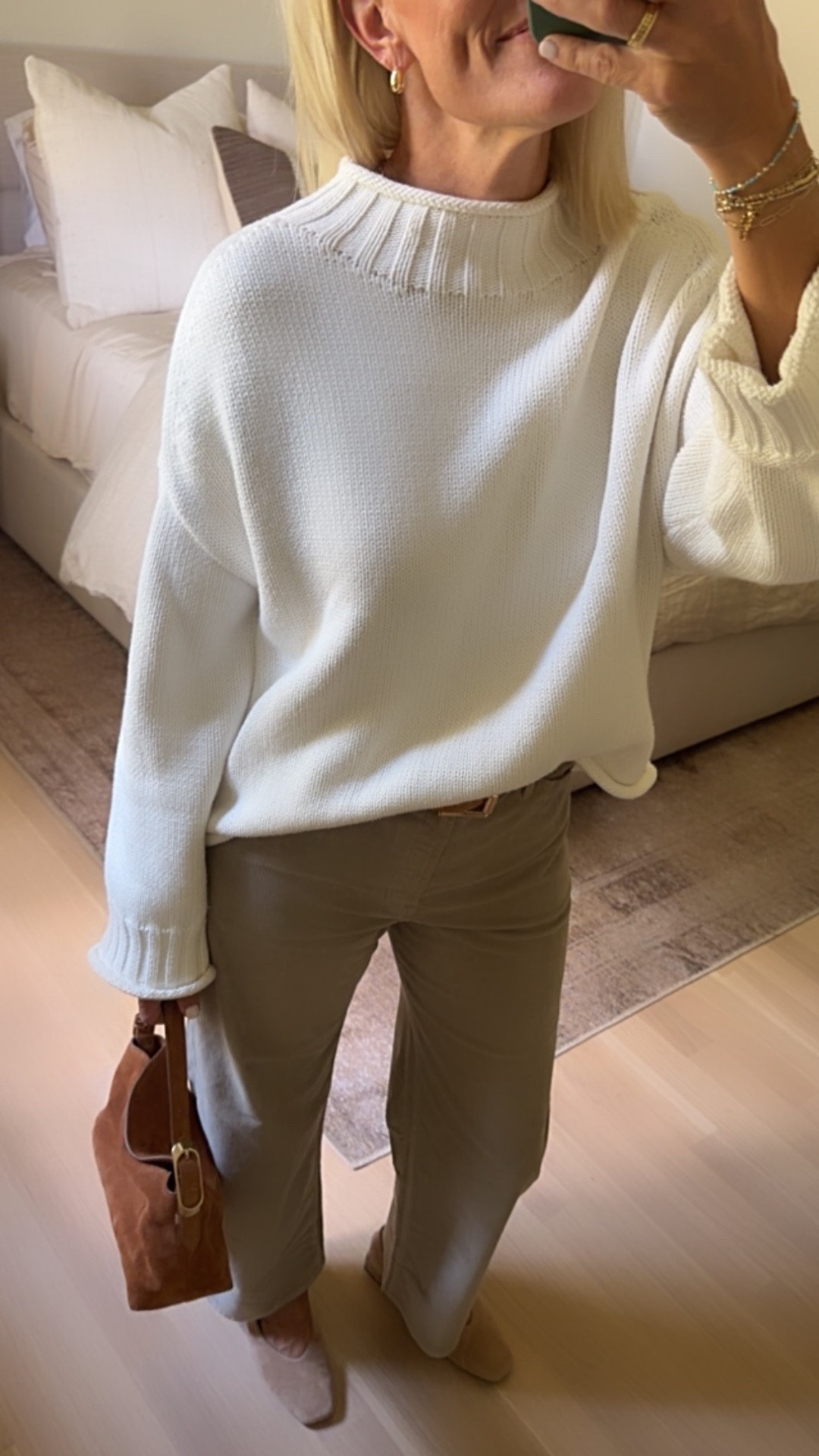 This 100% cotton rollneck sweater has that timeless neckline I love, with a relaxed fit that feels easy without looking boxy. I’m wearing it with neutral pants here, but it would be just as lovely with jeans, trousers, or leggings.

It’s exactly the kind of classic, comfortable sweater I want in my wardrobe year after year, easy to wear, easy to style, and not tied to a passing trend.

#LTKootd #LTKOver40 #LTKSeasonal