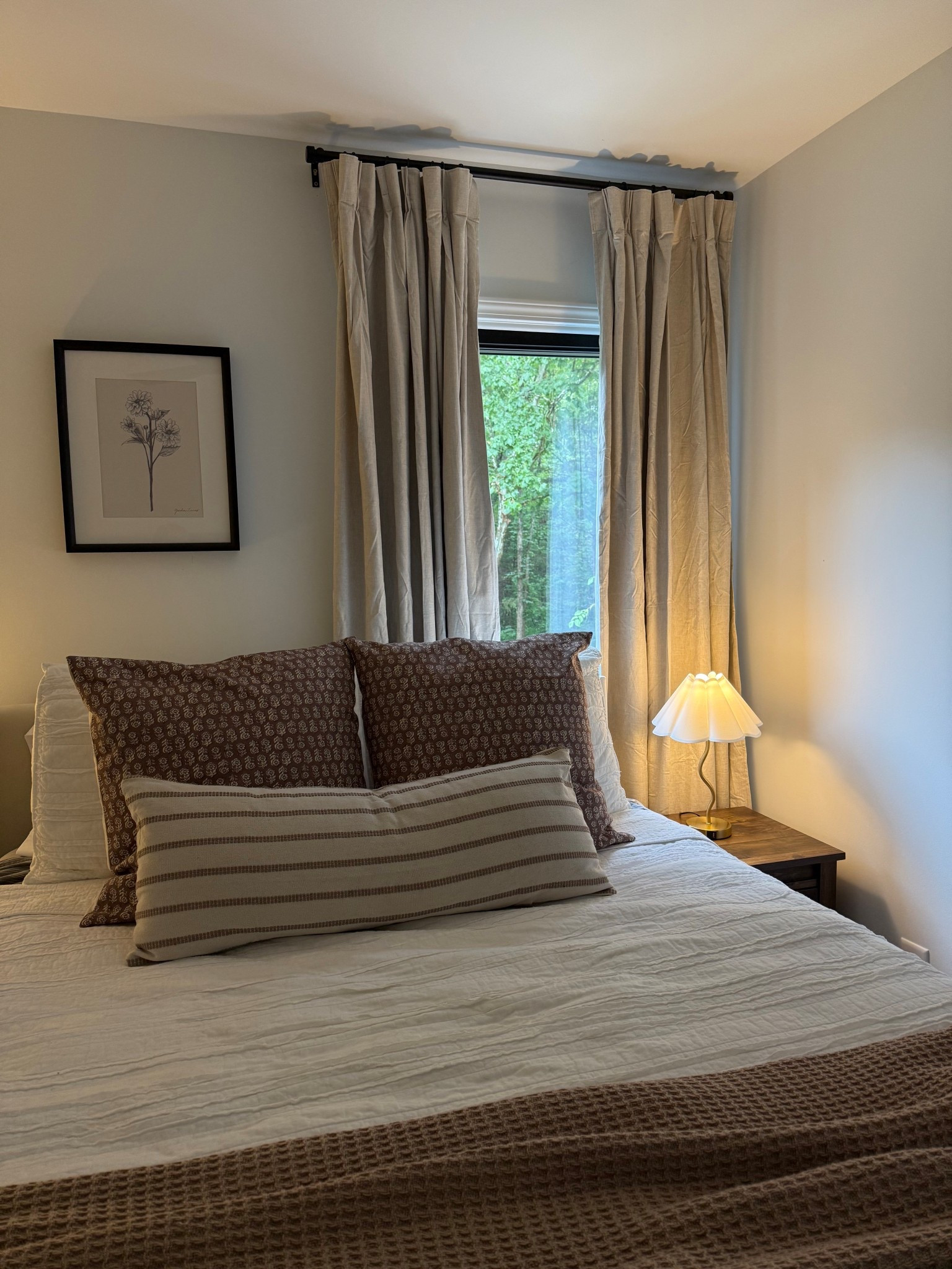 Guest bedroom details 
Picture & quilt are old from target 
Side tables are also old 

#LTKHome