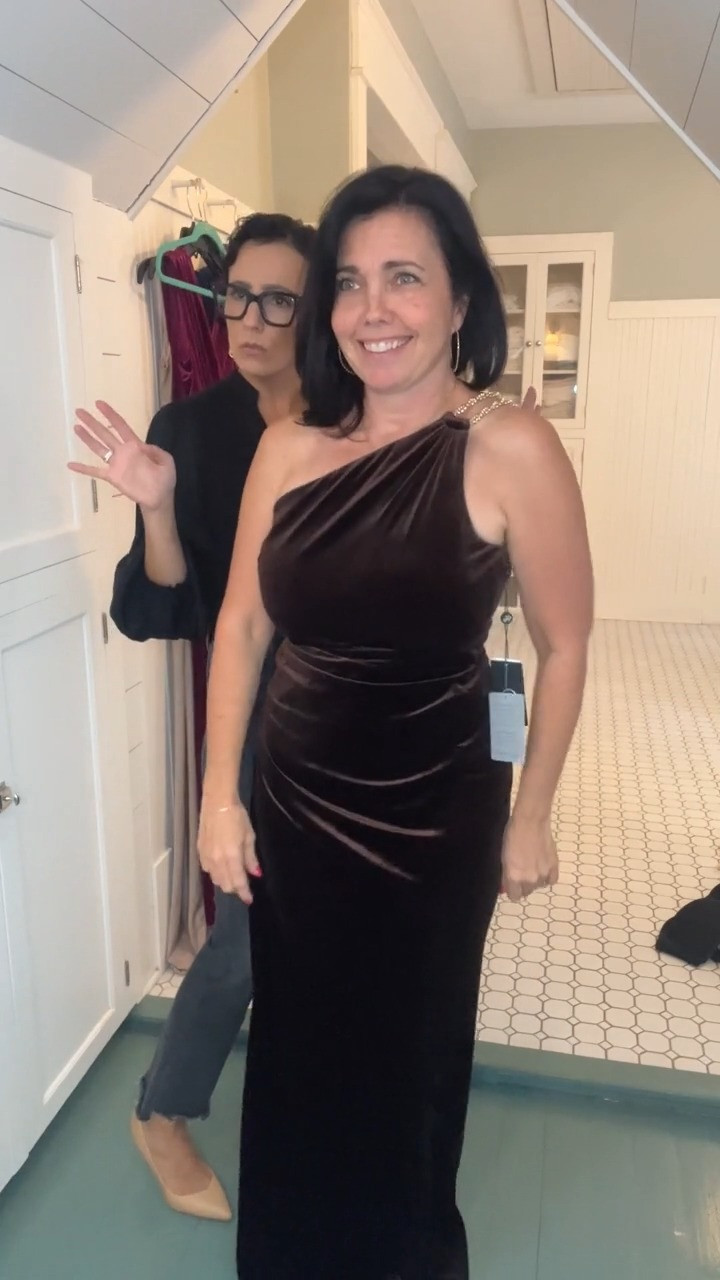 Brooklyn is rocking this dark brown one-shoulder velvet column gown by Adrianna Papell! The soft velvet fabric hugs her figure beautifully, creating an elegant, sleek silhouette. With gathered detailing on one side and a thigh-high slit at the front, this dress is the perfect blend of sophistication and style 

 #LTKHoliday #LTKSeasonal #LTKStyleTip