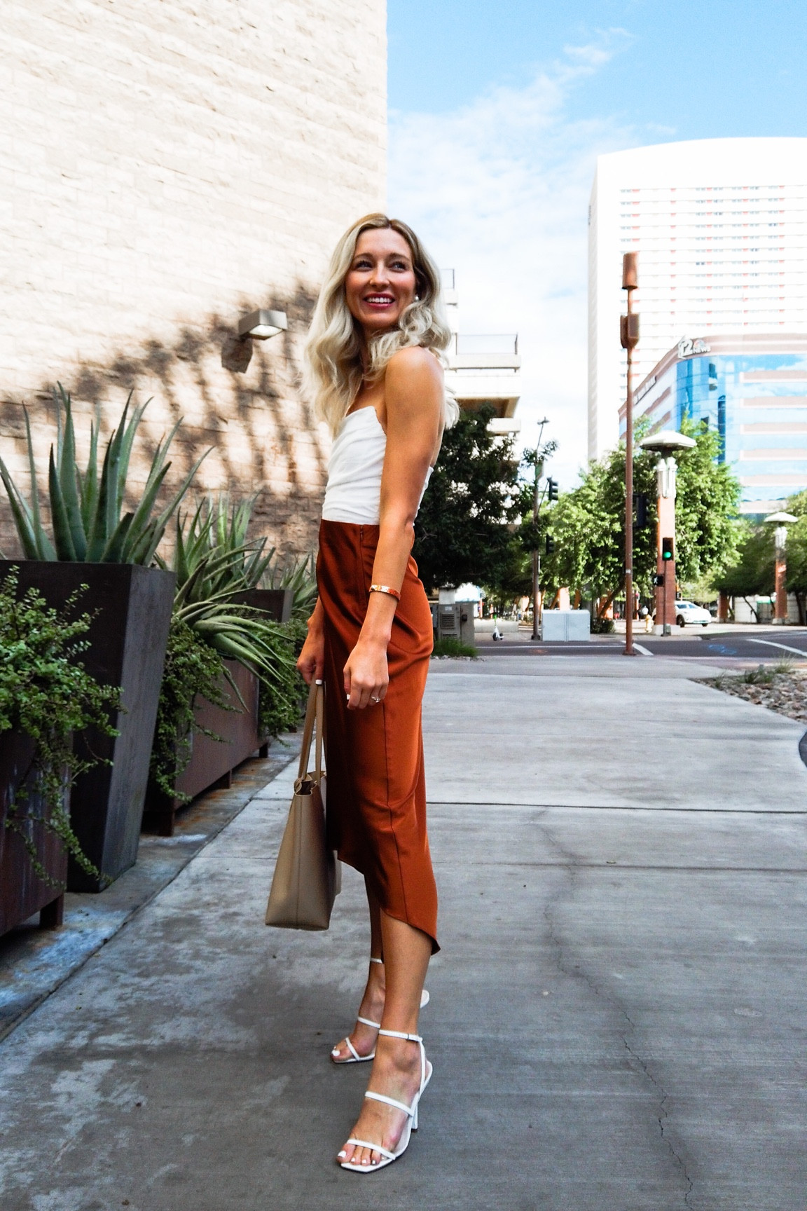 Silk skirt with my favorite Amazon crop corset top! Both under $50! Linking similar strappy white heels and a similar skirt! Copper satin skirt! Fall trend! 

#LTKsalealert #LTKSeasonal #LTKunder50