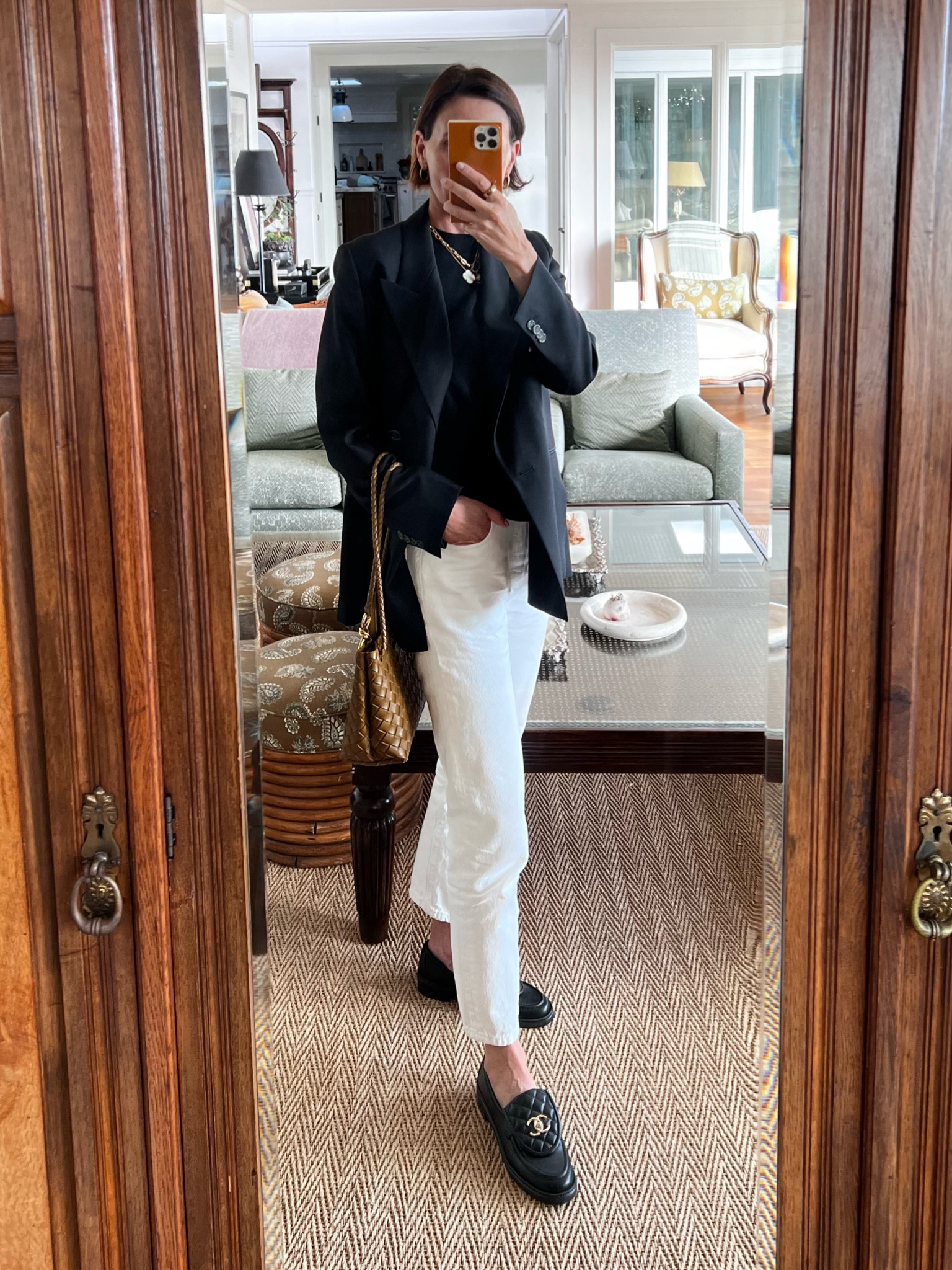 Wearing white jeans well into fall. It’s what you pair with them that makes the look relevant. Here with a light weight wool top and an oversized blazer. Grounded with loafers and accented with a contrasting color bag. 

Wearing:
ACNE STUDIOS blazer
LEVIS jeans
VINCE wool elbow length sleeve top 
BOTTEGA VENETA bag

All pieces linked below .

FALL UNIFORM ❤️

#LTKSeasonal #LTKStyleTip #LTKFallSale