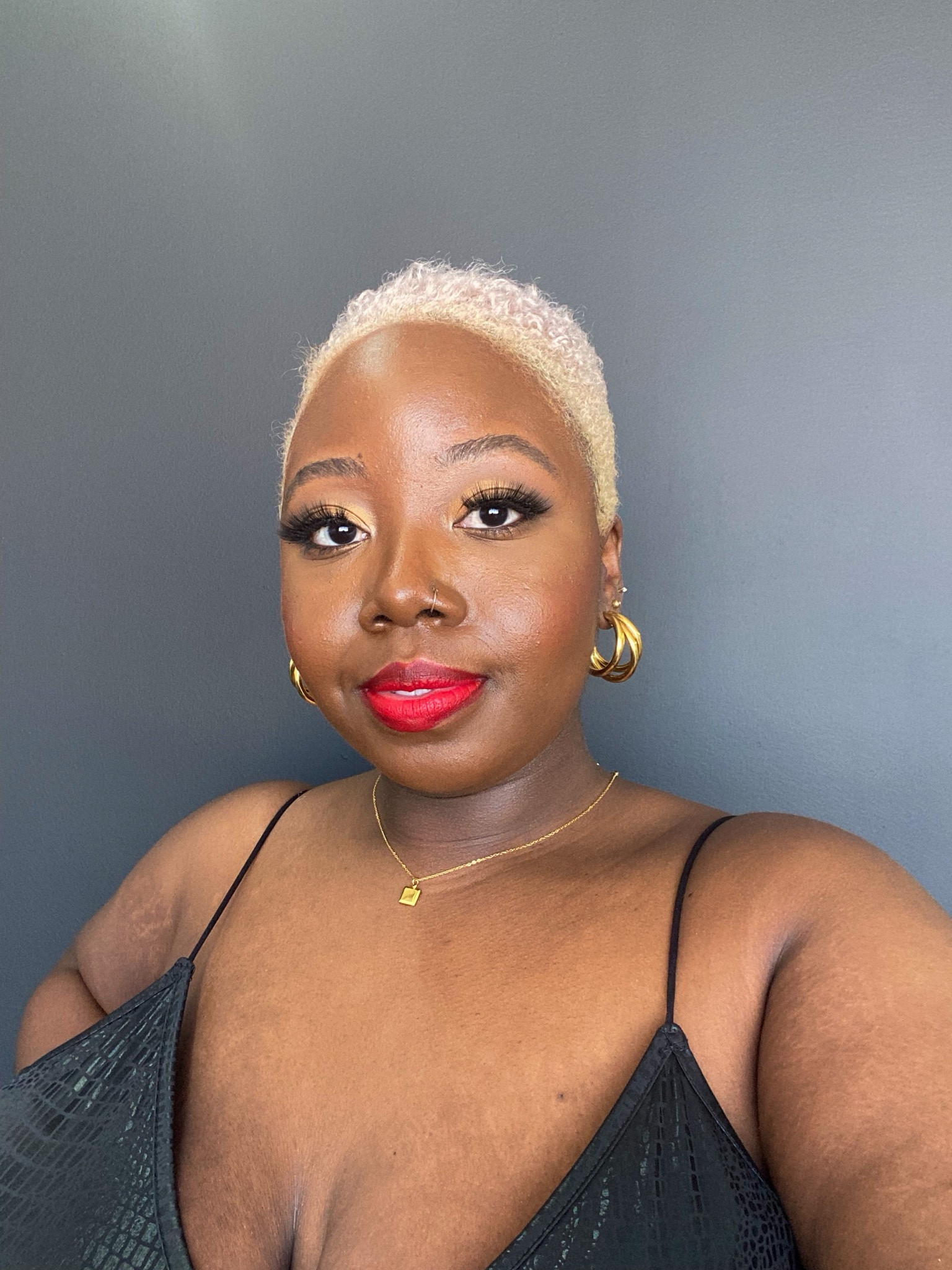 Starting this LTK Hard challenge with a throwback photo. Giving all types of pops of color 😌 I might have to go back to blonde and I haven’t worn a red lip in a minute, is it time? Ruby Woo is a perfect red for me! 

#LTKFindsUnder50 #LTKPlusSize #LTKBeauty