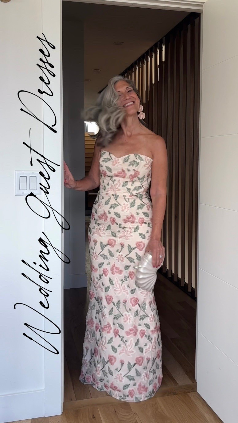 🌹 the embroidered column that photographs beautifully from every angle.

A strapless blush rose-embroidered column with a sweetheart bodice and a fitted silhouette that holds and elongates beautifully all evening long. 

The delicate floral embroidery moves with total effortless sophistication so you can simply be present for every single moment.

Save this for your next invitation. 

Share it with a friend who’s shopping. 💌

#weddingguestdress #motherofthebride #blacktiewedding #weddingseason2026 #occasiondress

#LTKOver40 #LTKSeasonal #LTKWedding