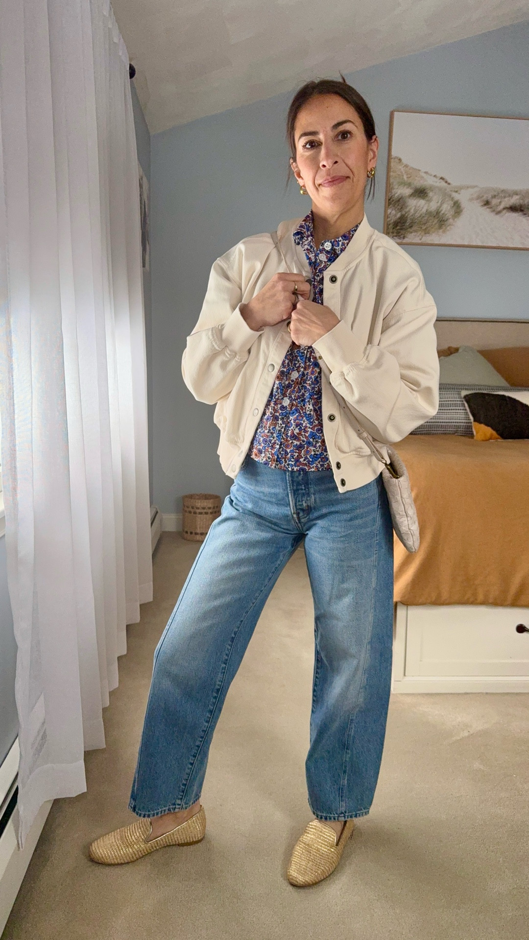 Spring Transition outfit 👌🏻 
Easy, simple and put together. This shirt has been a fan favorite from @Anthropologie and these jeans I own in multiple pairs from @Madewell They are flattering and comfortable. The length is perfect for me at 5’2. The outfit all comes together with these beautiful @jackrogersusa  They are raffia with gold specs throughout and lines with gold. I cannot say enough how comfortable and true to size these flats are. A perfect staple piece perfect when we aren’t ready for open toe shoes but also fit just as well during the summer months as they do in the spring! @jackrogersusa 
@bonheur hoops

Sizing:
Jeans- 23/reg
Shirt- xs
Shoes- 7

#jackrogersusa
#ad

#LTKmomlife #LTKgrwm