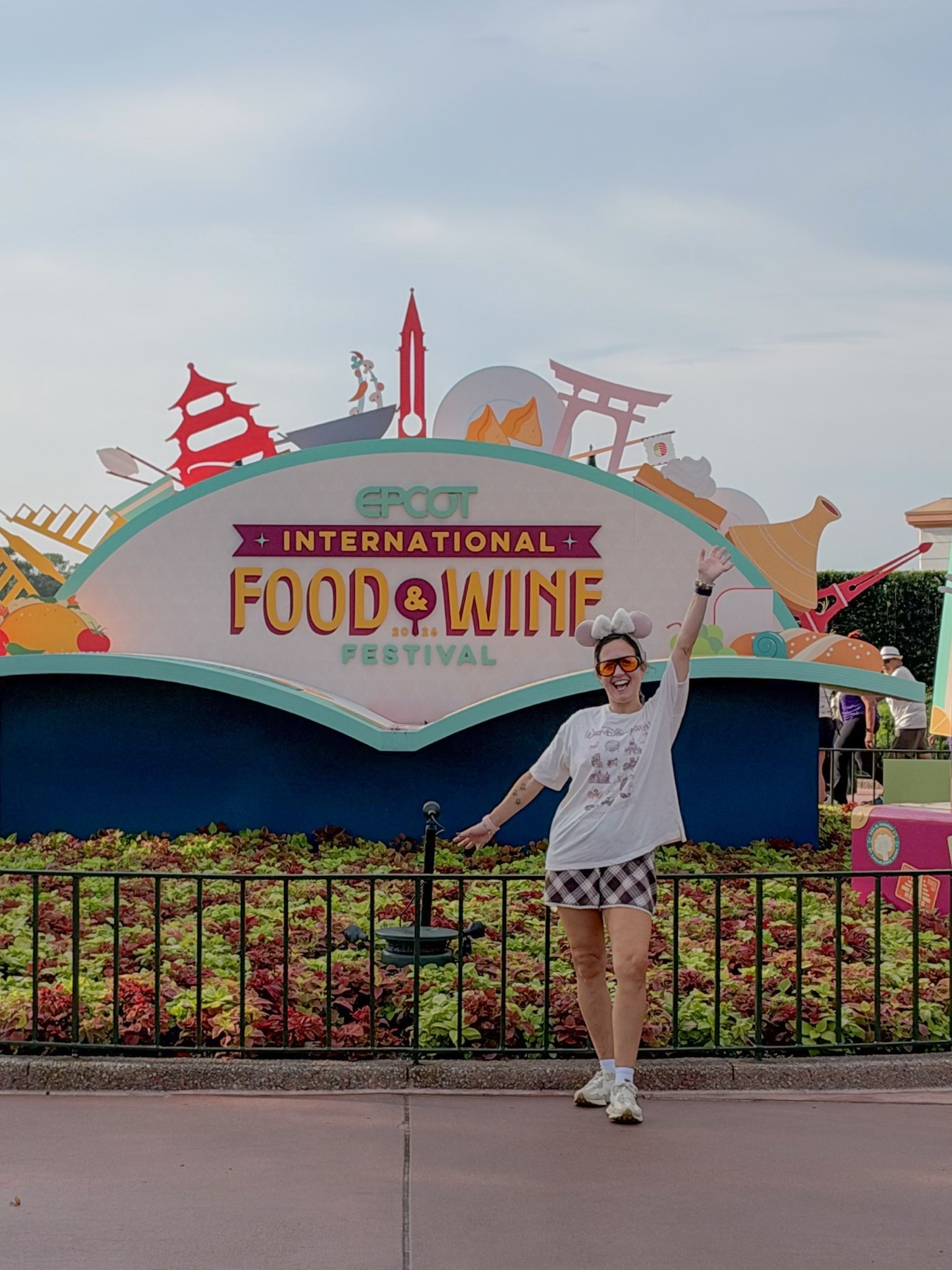 Disney fit! Epcot food and wine festival. Disney t, Aerie sleep shorts that were so cozy for the day, New Balance sneakers with Bombas ankle socks. Sunglasses from Amazon.