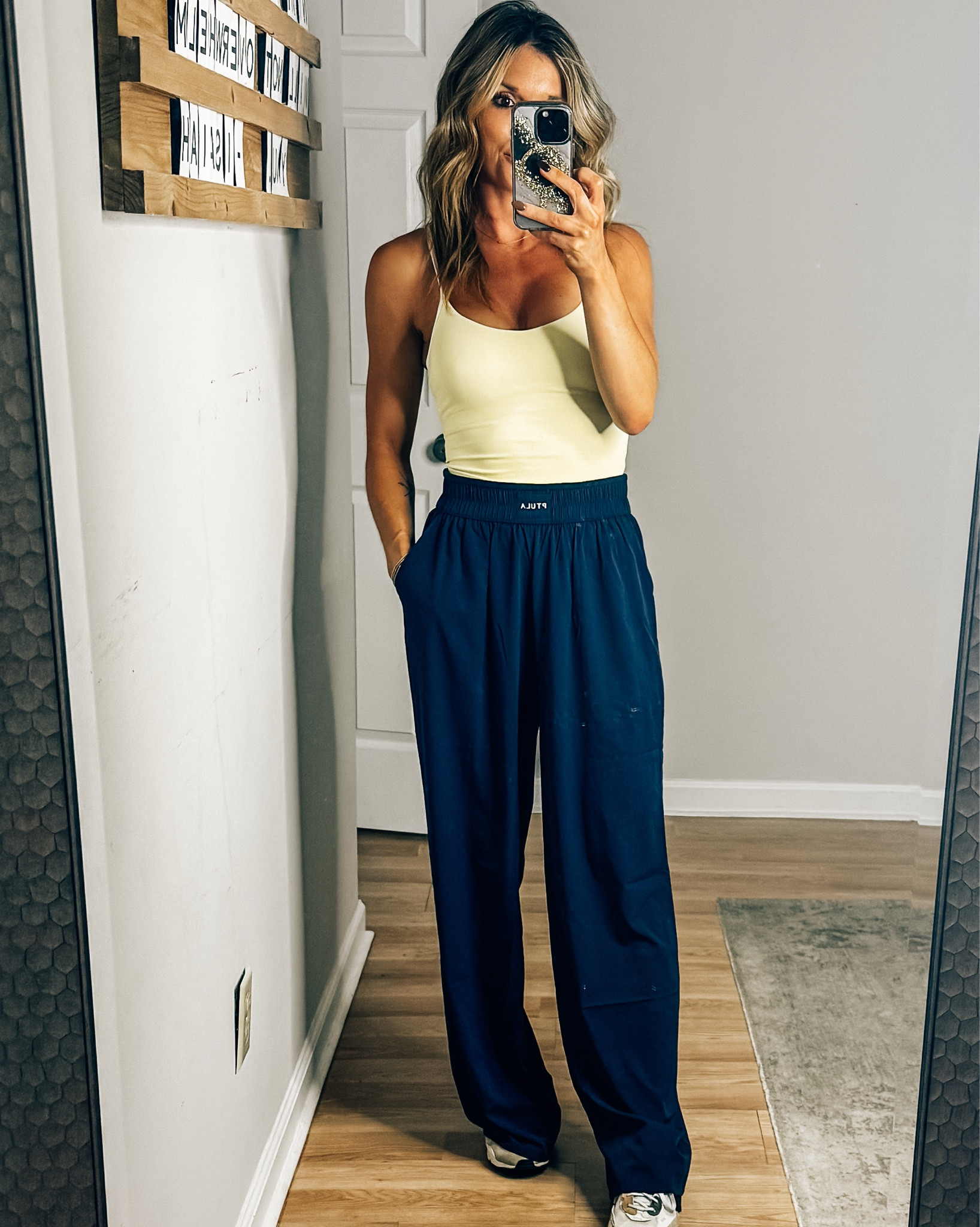 Obsessed with this navy & butter yellow combo 💙💛 Ptula is hands down one of my favs for lounge and workout wear! Both currently on sale! 

#LTKSaleAlert #LTKActive #LTKFindsUnder50