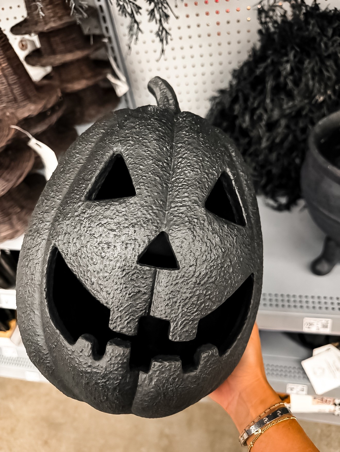 This black jack o lantern is such a fun switch from traditional orange Halloween decor. I love the textured finish and oversized face for adding a slightly spooky touch to a porch, entryway, or fireplace without going overboard.

Halloween decor, black pumpkin, jack o lantern, fall home decor, spooky decor, Halloween decorations, porch decor, entryway decor, pumpkin decor, fall decorating, TheMomInStyle

#LTKHome #LTKstorytime #LTKSeasonal