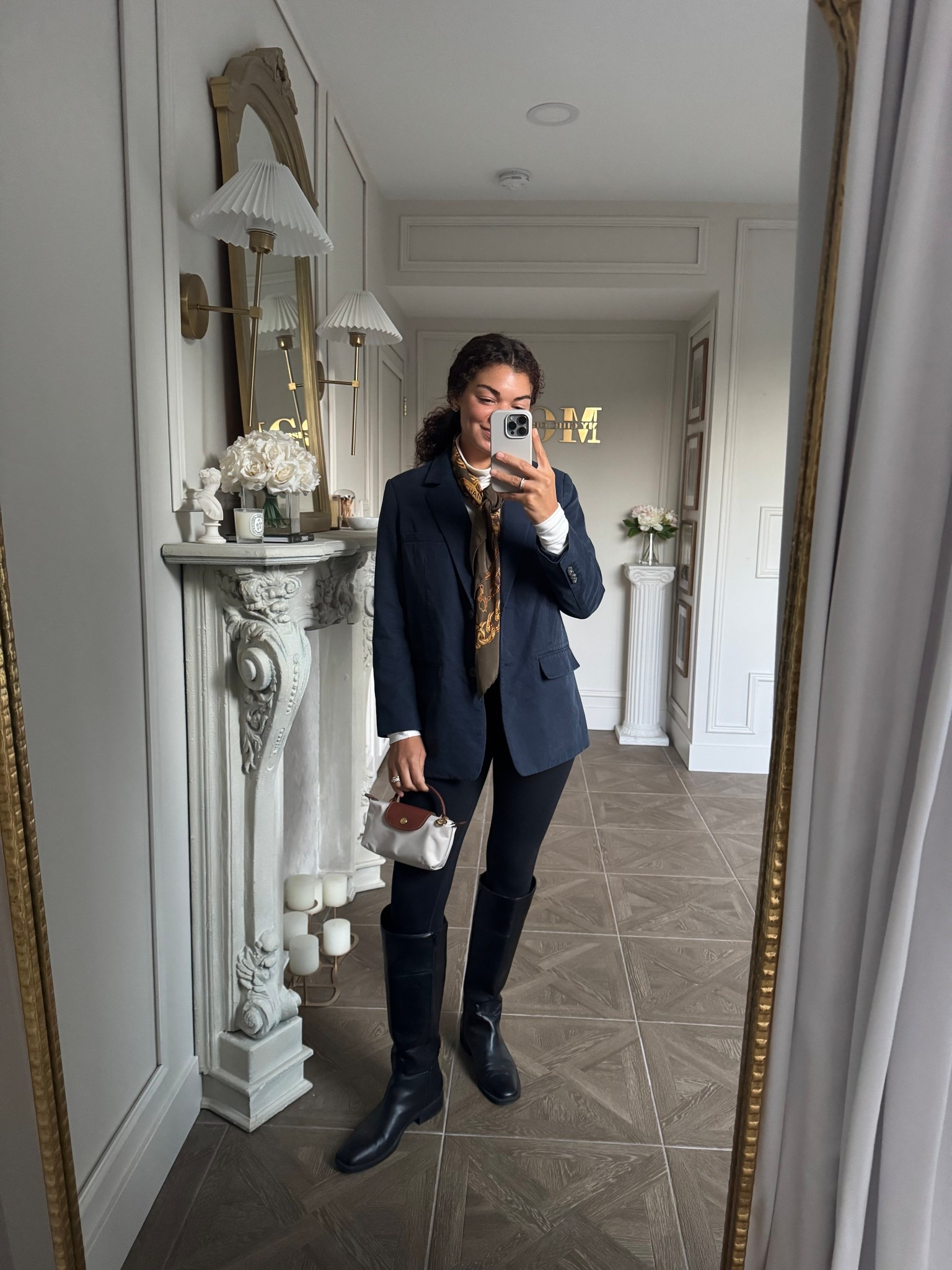 Preppy fall outfit: leggings, riding boots, turtleneck, oversized blazer, and silk scarf 

#LTKSeasonal #LTKStyleTip