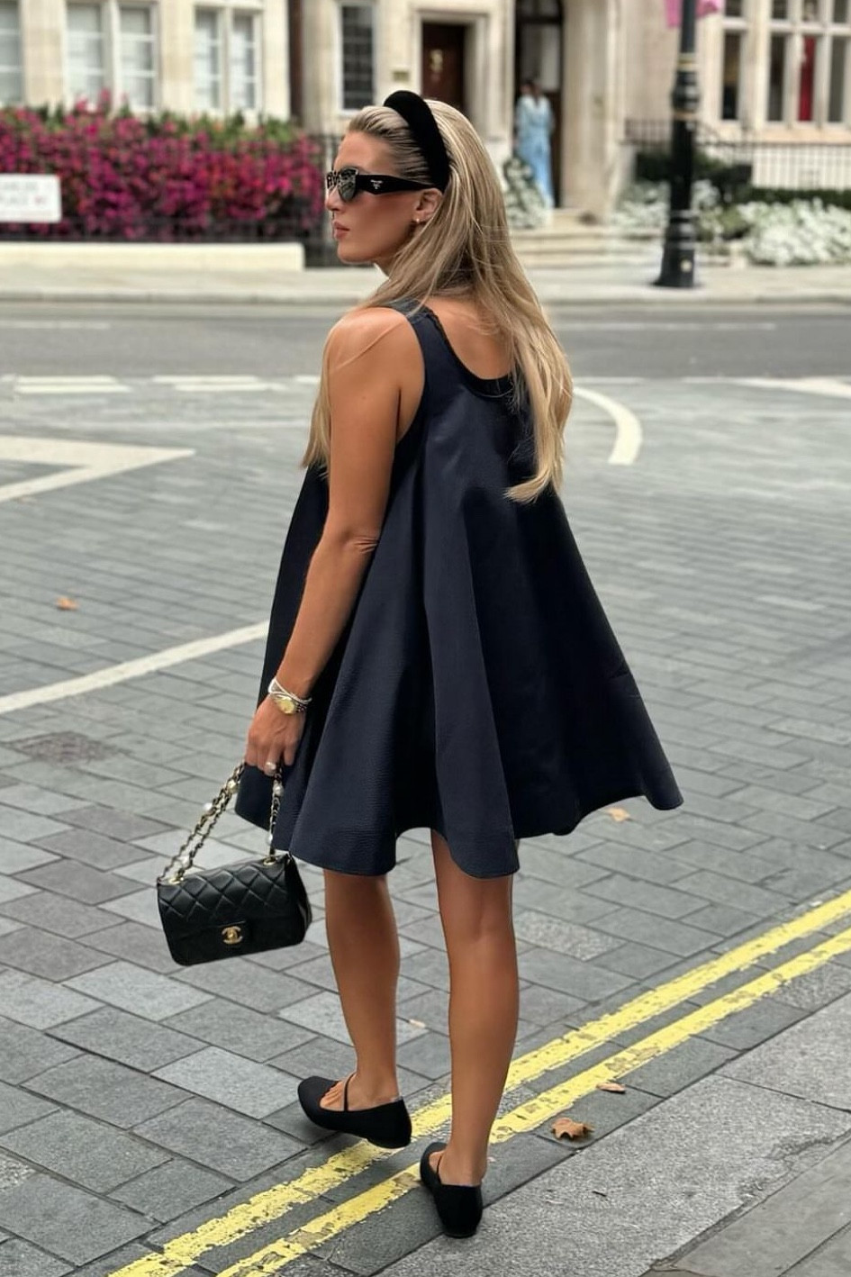 Shop Madison LeCroy's Double-Layer Trapeze Mini Dress and Rectangular frame sunglasses and quilted shoulder bag 

#LTKTravel #LTKStyleTip