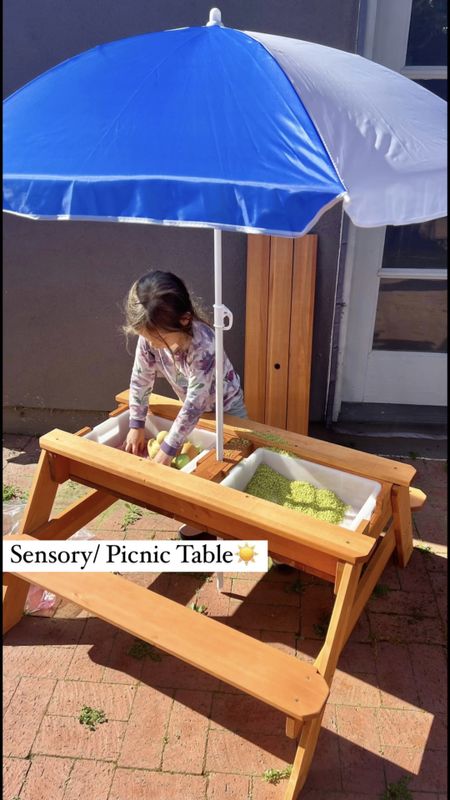 The perfect activity, sensory and picnic table for toddlers and kids! Leaves the sensory mess outside and the table is great quality made from real wood! The center lifts up and the sensory storage bins hide right under ☀️#kidstable #sensorytable #pocnictable 

#LTKfindsunder100 #LTKfamily #LTKkids