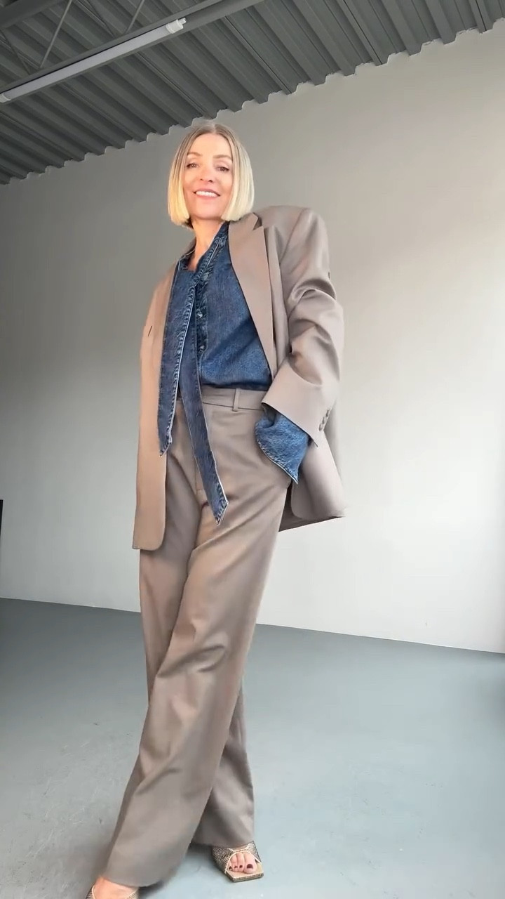 This isn’t the corporate set-up you remember. I started with a neutral base - wide-leg trousers and a matching blazer - and layered in pieces that shift the tone completely: a denim shirt, undone bow, and delicate heels with a bit of sparkle.
The neutral palette makes it easy to accessorize and play with... gold cross earrings, brown optical frames, and the mood shifts again. It’s structured, but not strict. Tailored, but with room for personality.

📍A pantsuit doesn't have to be formal or predictable. You can reframe it, reshape it, make it yours.

More ways to wear it coming soon! This is just the start. ⚡️

Links coming up in stories 🏃🏼‍♀️‍➡️

#over40 #over50 #styleover40 #pantsuit #blazersuit #taupesuit #howtowearit #denimshirt #thefrankieshop #giaborghini #tomford