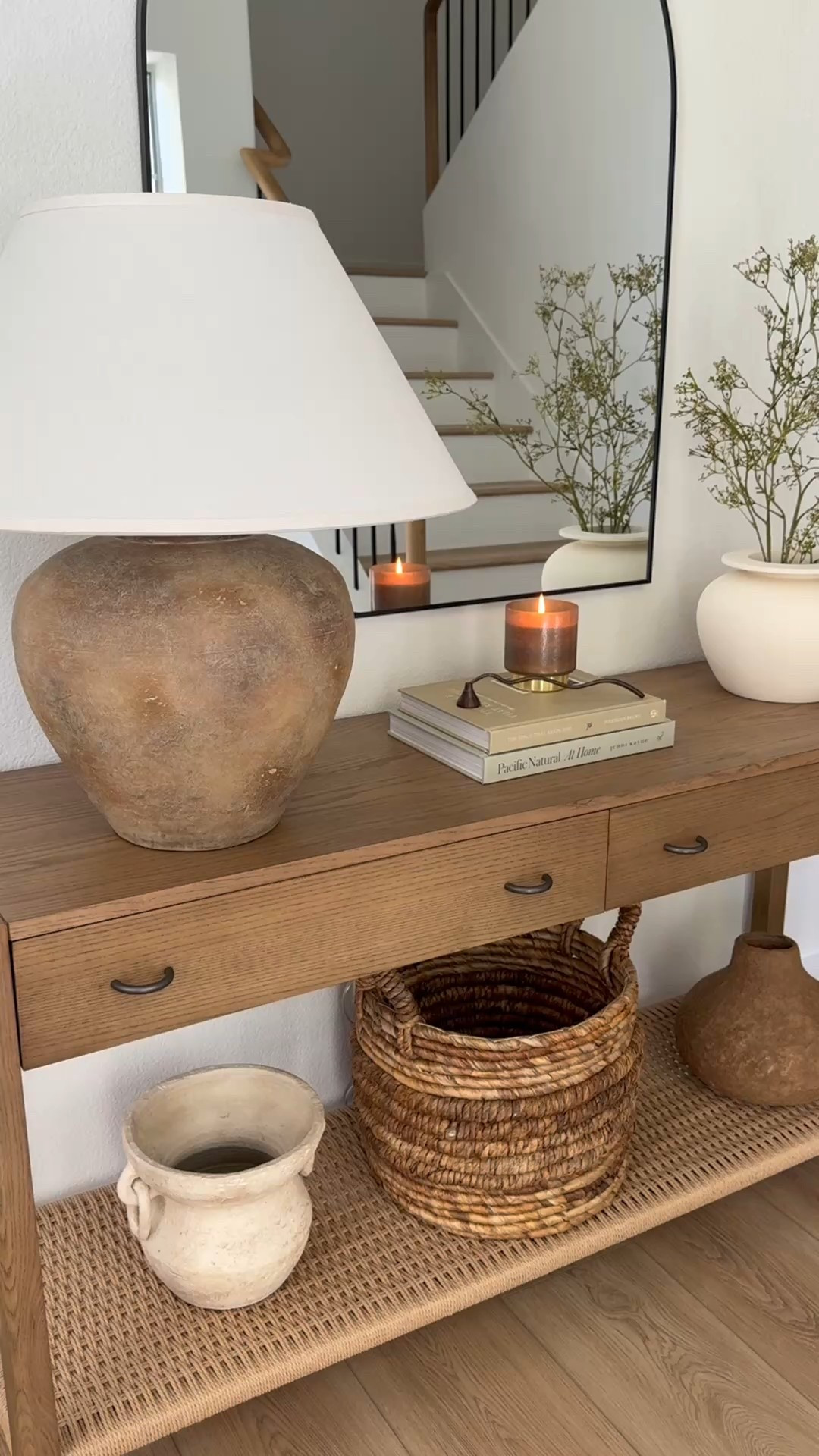 Entryway refresh and your reminder to light your candles! 

Love the warm brown and brass on this candle and the smell of soft vanilla
scent. This large earthy table lamp is a splurge but it makes such a statement. And last but not least, my new console is a new favorite with its beautiful woven detail and warm wood tone. 

Entryway styling, console table decor, modern organic home decor  

#LTKU #LTKHome #LTKStyleTip