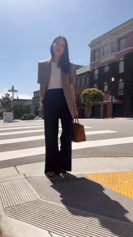 Outfit check in SF ✔️ Back at it this morning after a lovely family weekend (more on that in stories soon). PS: This short-sleeved blazer was love at first sight - details on my blog: https://9to5chic.com/2024/06/short-sleeved-blazer.html

#outfitcheck #workoutfit #widelegpants #whattoweartowork #classicstyle #sportmax #hermesbirkin30 #goldbirkin

#LTKWorkwear #LTKVideo #LTKStyleTip