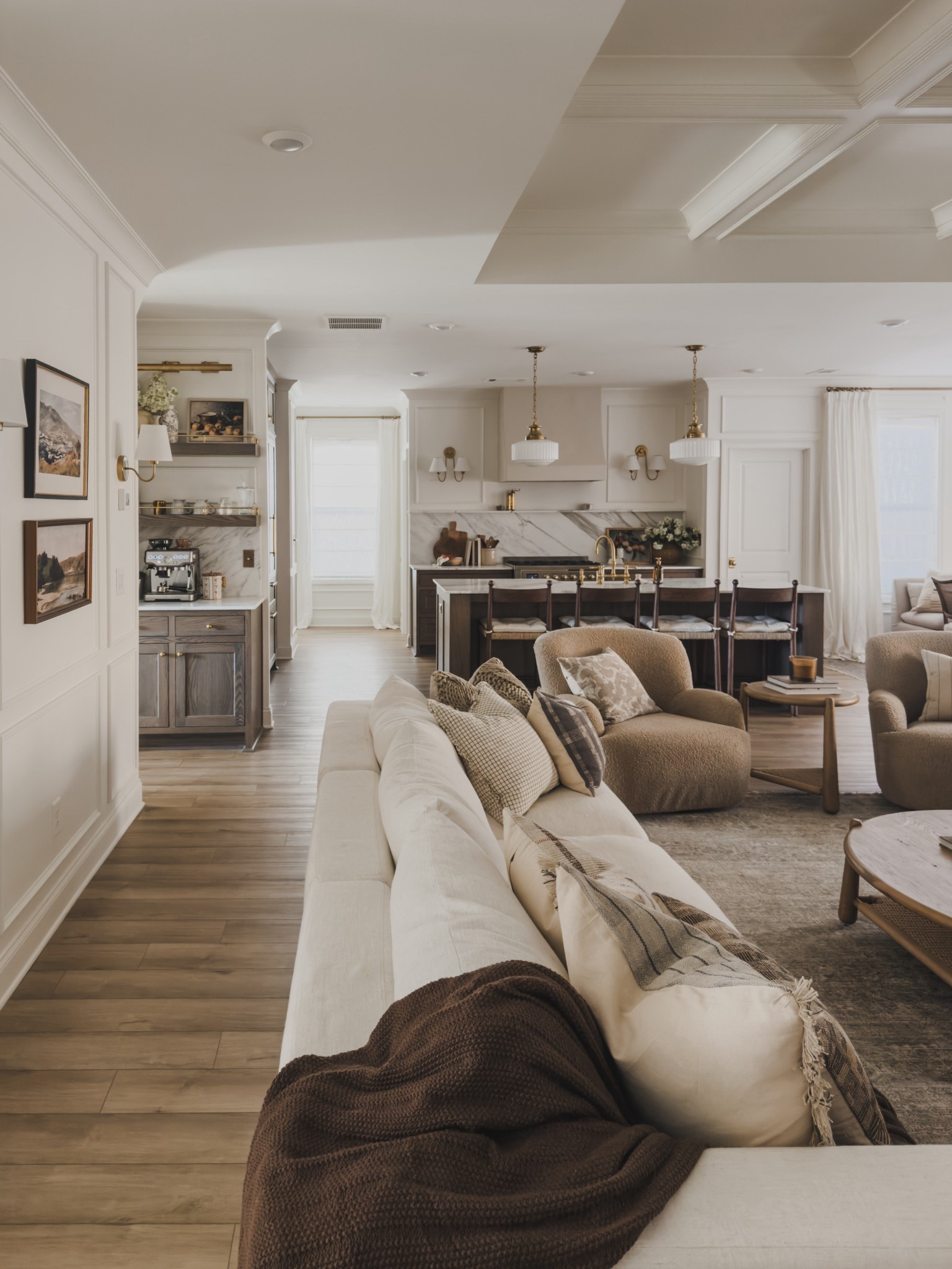 Cozy, collected living room details. When creating an open concept space, I chose to add in timeless and layered pieces that flow through each space. While I believe in quality finds, I also found the best look for less finds that will last through each season. 

Home finds, neutral home inspo, collected style, living room refresh, sofa details, accent chair, neutral area rug, open concept style, round coffee table, pendant lighting, brass detail, kitchen barstool, cozy throw pillow, linen curtain, spring refresh, gallery wall, Castlery, Pottery Barn style, Wayfair, Loloi, Amber Lewis, Visual Comfort, Look for Less, Four Hands, found it on Amazon, Two Pages, shop the look!

#LTKSeasonal #LTKHome