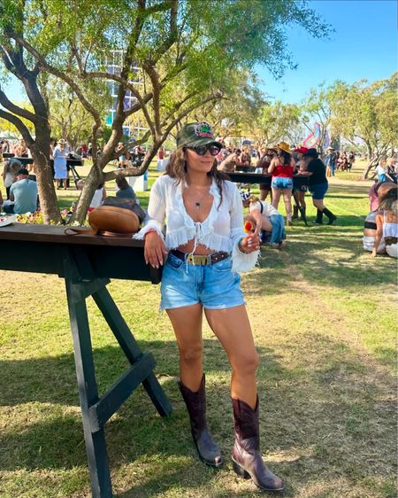 My Stagecoach day 1 outfit: Zara tie top, Good American shorts, Alvie’s boots and a trucker hat. #countryconcertoutfit #concertoutfit 

#LTKFestival