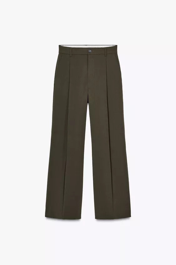 High-waist trousers with belt loops. Darts on the front. Side pockets and rear welt pockets. Zip ... | Zara US
