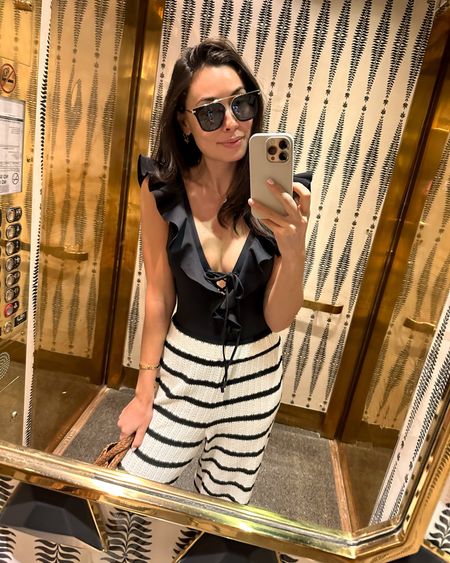 Kat Jamieson wears a Zimmermann swimsuit (similar below) and stripe pants in Palm Beach, Florida. Vacation style, swimwear, swim. 

#LTKSeasonal #LTKtravel #LTKswim