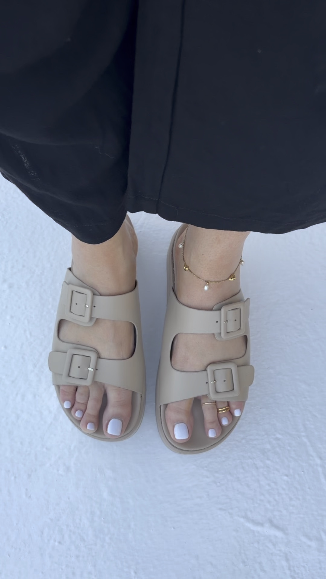 Comfortable and actually flattering pool sandals. Supportive, adjustable, look more expensive than they are. Plus, you always need an anklet and toe ring for a beach trip. 
