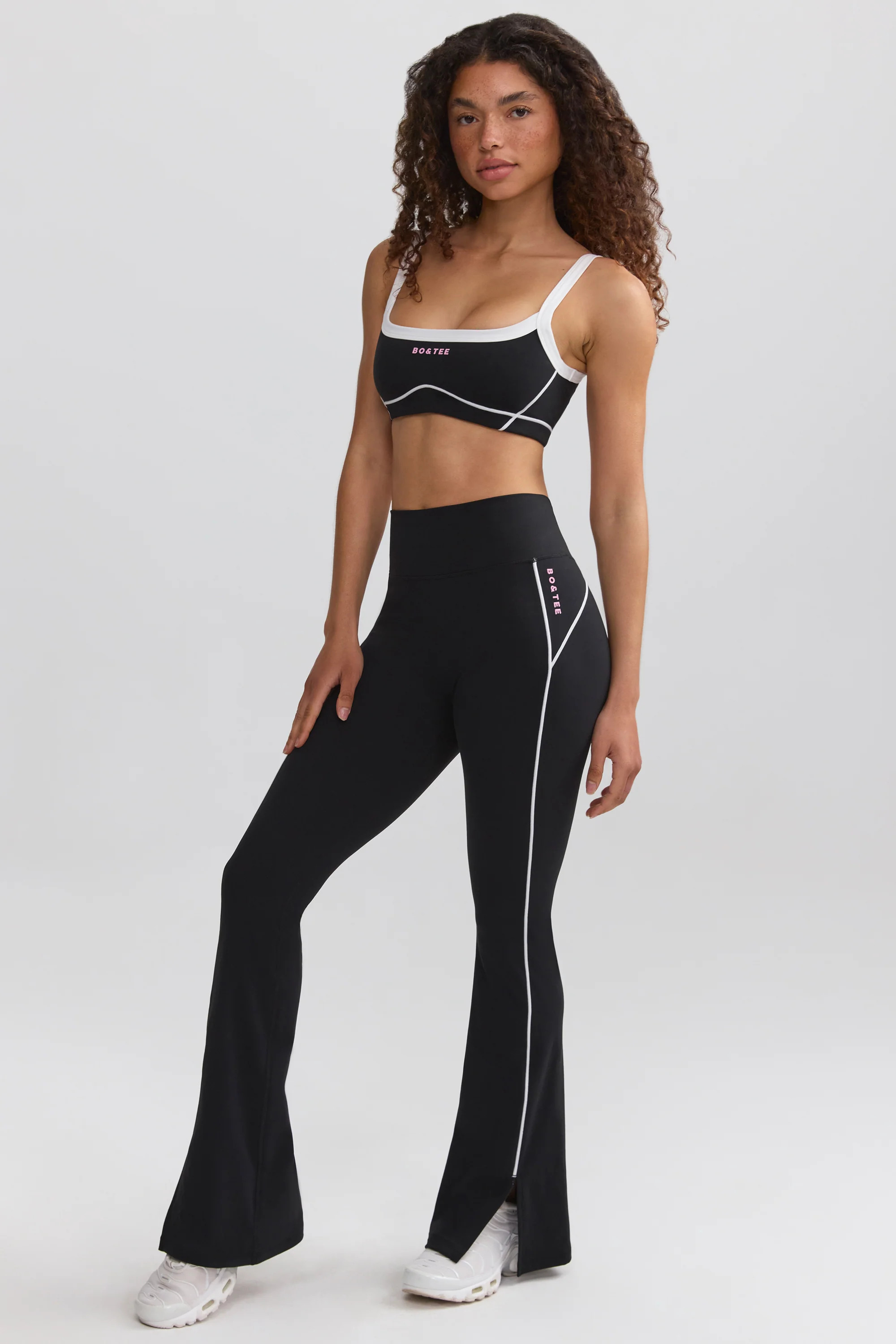 Soft Active Contrast-Trim Flared Trousers in Black | Oh Polly