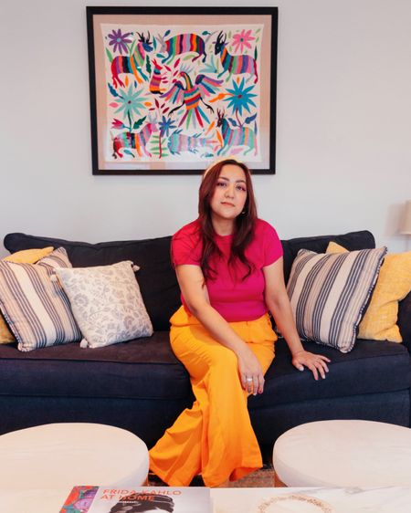 My living room decor! I’ve been waiting so long to have my own place and I’m so happy with how my home decor turned out! Sofa, decorative throw pillows, coffee table, wall art. A colorful, Mexican inspired living room. Boho eclectic decor. 
Add some color to your life 😊 And I love these orange pants and pink top!

#homedecor #livingroom #livingroomdecor #home #sofa #decorativepillows #throwpillows #color #colorfuldecor #eclectic #boho #mexican #mexicandecor #wallart #coffeetable #yellow #blue #orange #pink #trend #trending #ltkstyletip #springwear #springoutfit #springdecor

#LTKsalealert #LTKFind #LTKhome