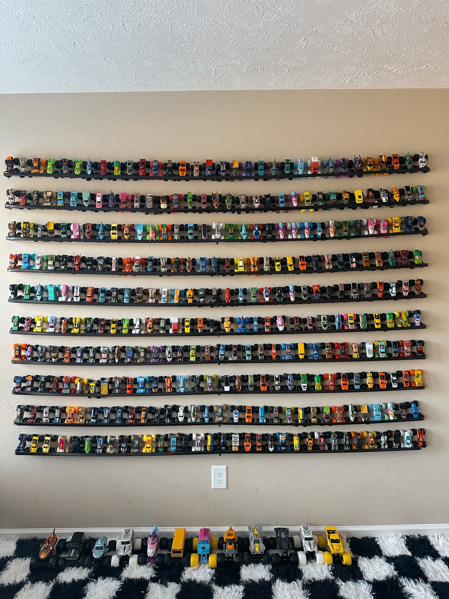 $2 monster truck storage. the middle hooks these came with were nottt great so we bought better ones at lowes!