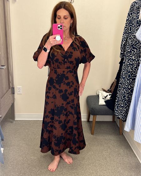 A line midi dress with puff sleeves. It's a brown and black floral print perfect for any time of the year. Wear to weddings, brunch or a dinner date. I'm wearing size small.
#datenightoutfit #weddingguest #petitefashion #outfitinspo

#LTKFind #LTKstyletip #LTKwedding