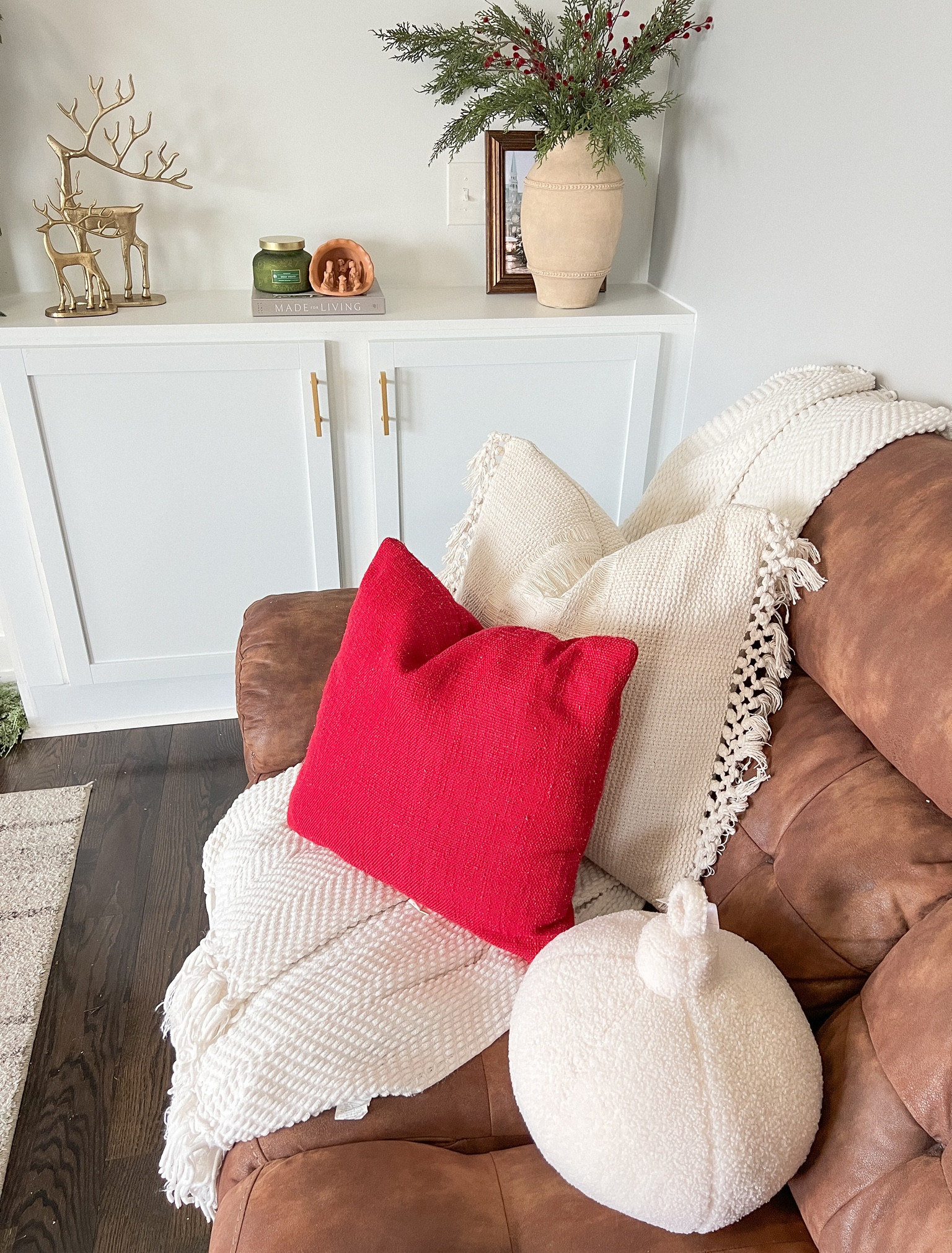 Neutral Beige knit throw pillows for winter couches layering and a bit of pop of color with the solid red ones. 

#LTKhome #LTKHoliday #LTKSeasonal
