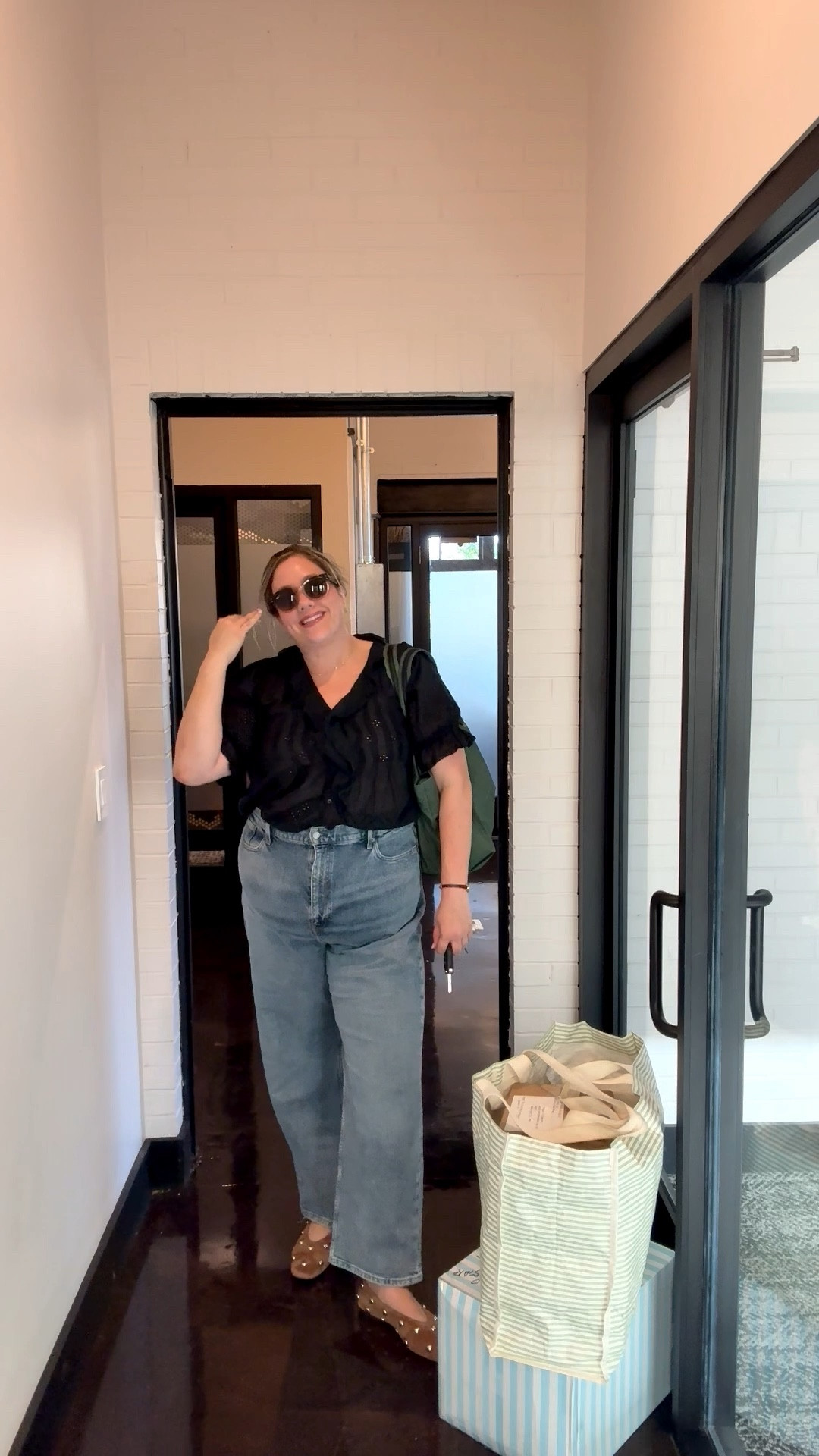 Madewell x LTK sale - 20% off  
The top is Madewell and fits a little big according to the size chart as I'm a size 20 and can fit in the XXL. It is short, though, but probably not on a problem for most people as I'm 5'10 with long torso. 

Jeans are high waisted Banana Republic in the medium wash. I'm apple shape so they're a little baggy in hips and legs; but fit waist. Not wide leg, but baggy. I'm usually a 20 and these are a 35. 

Loveee the studded Mylie shoes. You could probably size down half a size. Use crep suede protector. 

Sunglasses are Rayban mega Hawkeye. And bag is vee collective! 

#LTKxMadewell