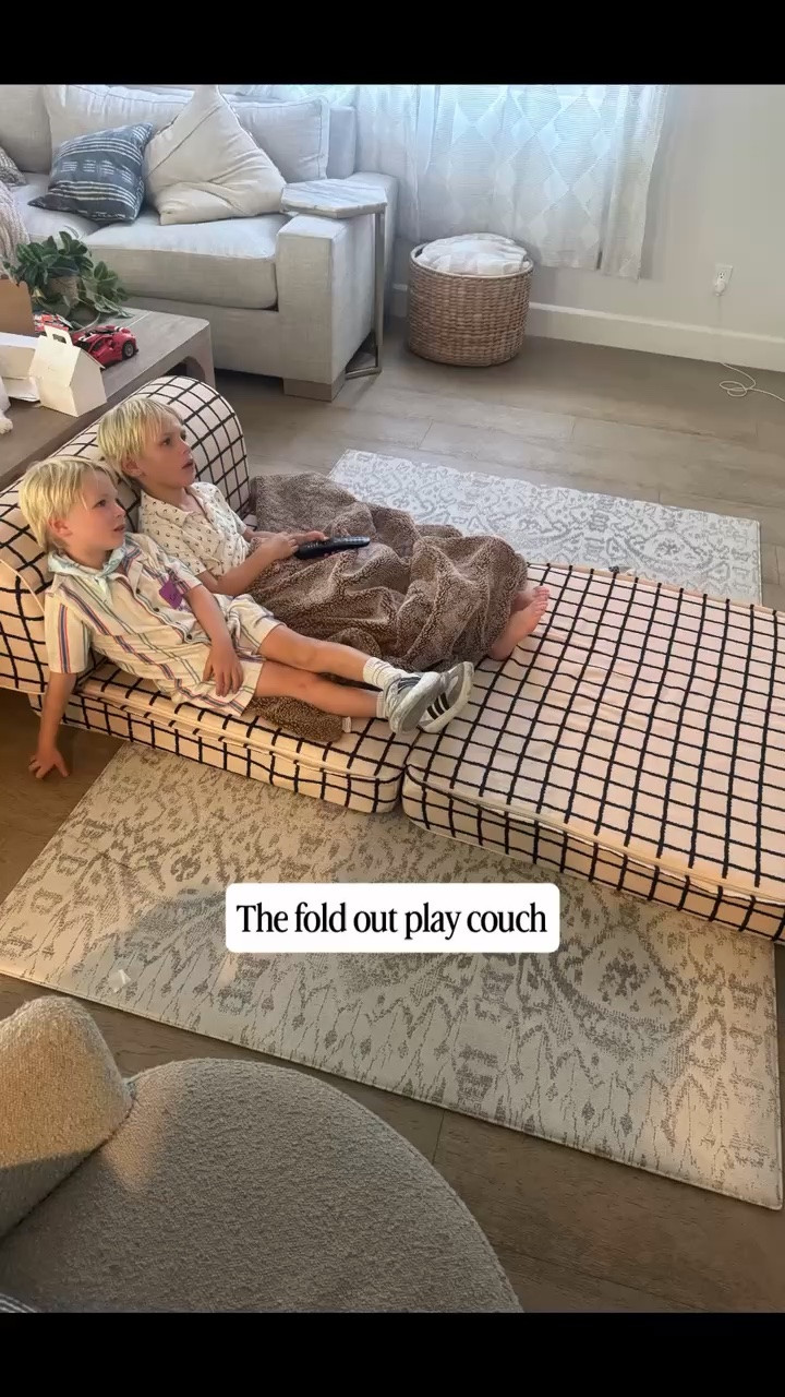 These fold out play couches maybe one of my favorite purchases.  My boys are obsessed with them for lounging. jumping around on and more. They’re easy to move around the house and so comfy to lay on.  ￼

Playroom furniture  | kids furniture | soft furniture