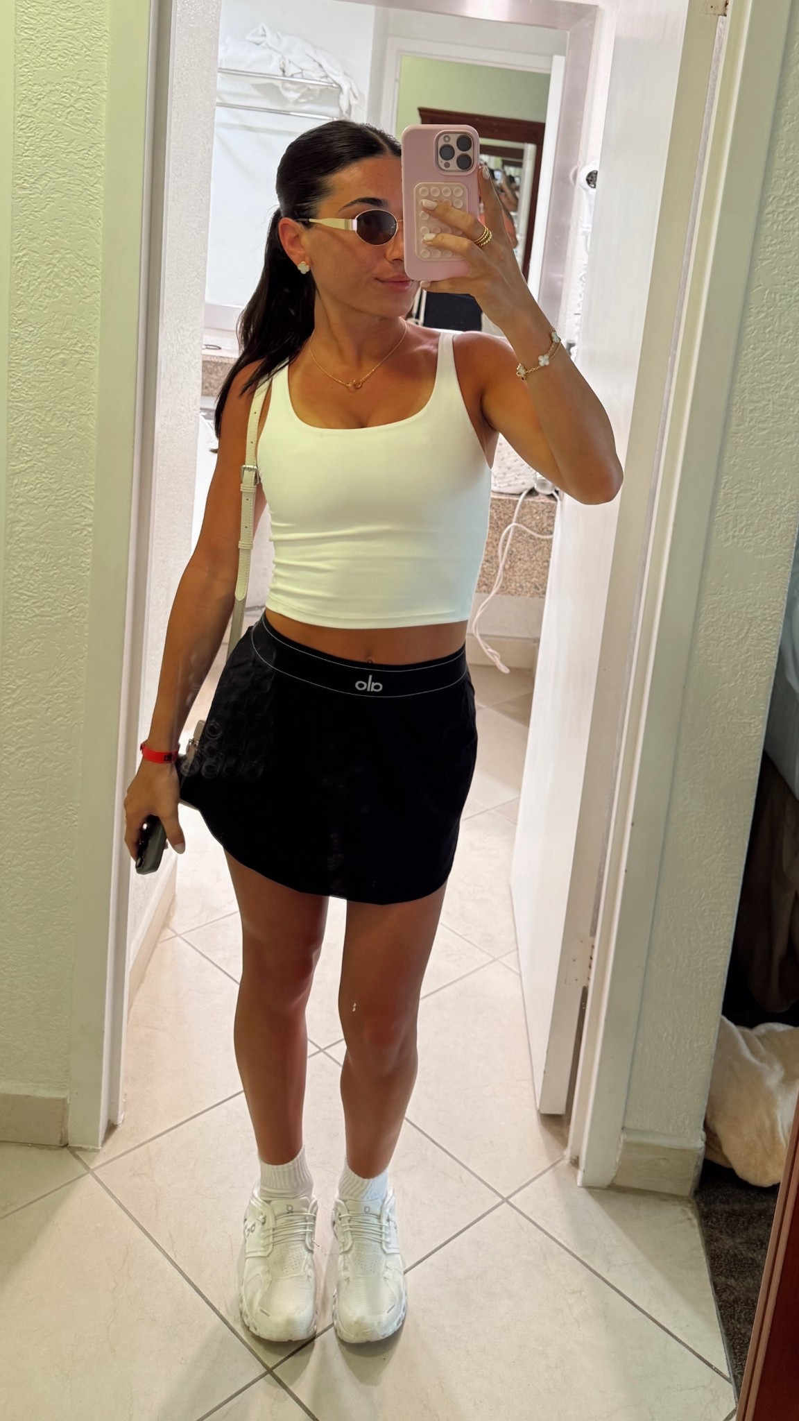 Adventure fit 👟

Top - old navy
Skirt - alo 
Sneakers - oncloud 