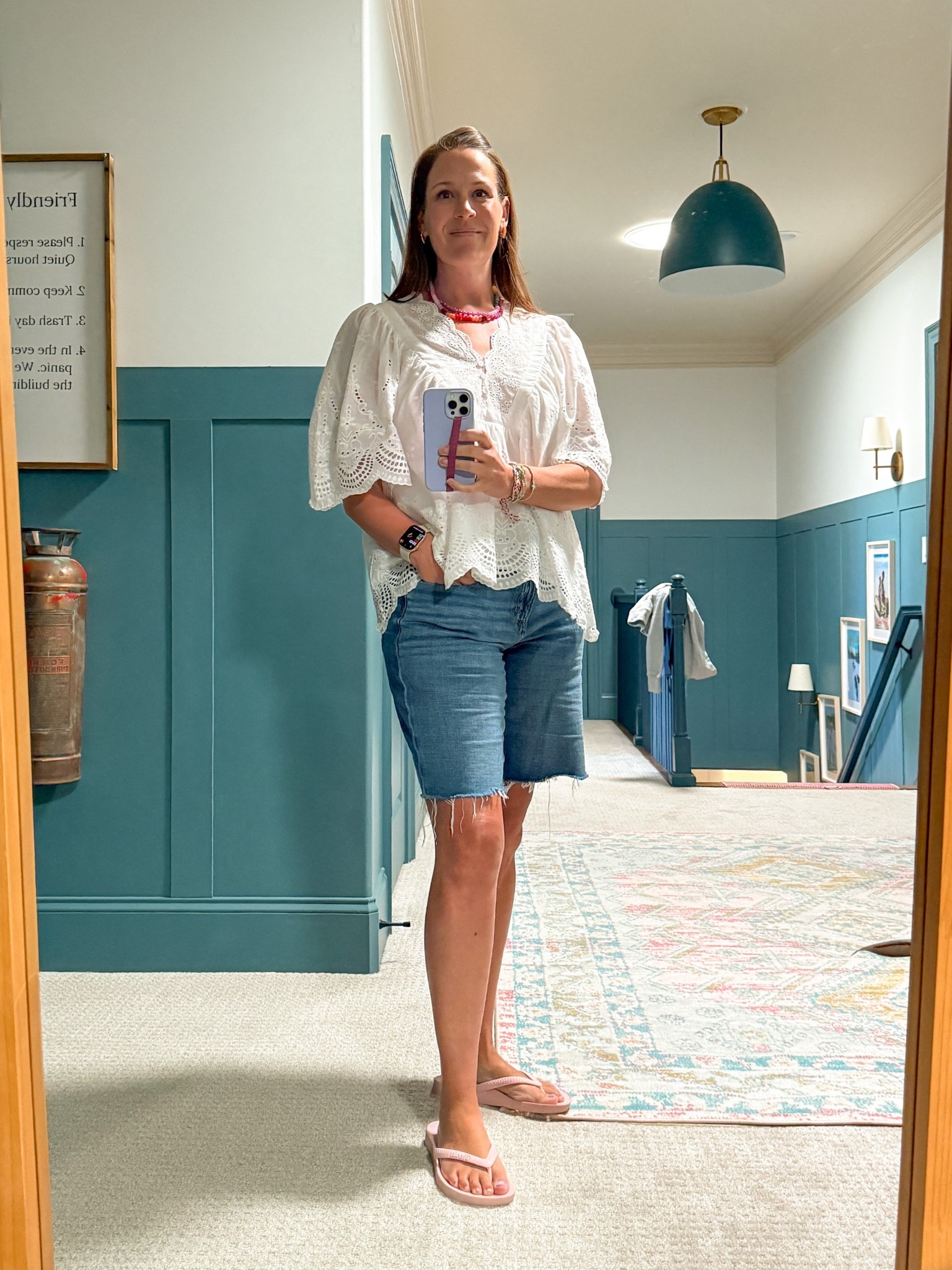 The eyelet top that I’ve been asked so much about is finally back in stock! It’s easy to dress up or down and super comfy. I’ve linked my shorts also— I cut off the finished hem myself.

#LTKOver40 #LTKMidsize #LTKSeasonal