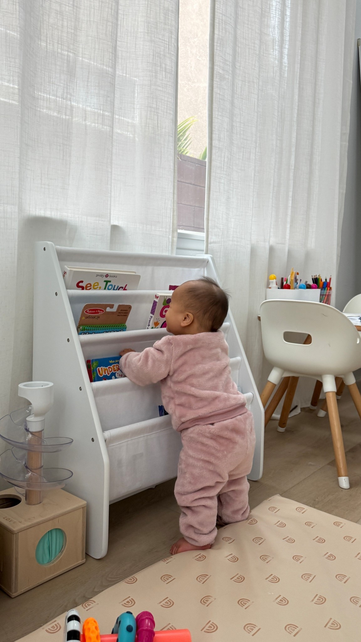 love this book rack that’s fun for toddlers and little ones because they can see all the covers of books! #playroom #momof2 #motherhood #bookshelf 

#LTKGiftGuide #LTKCyberWeek #LTKKids