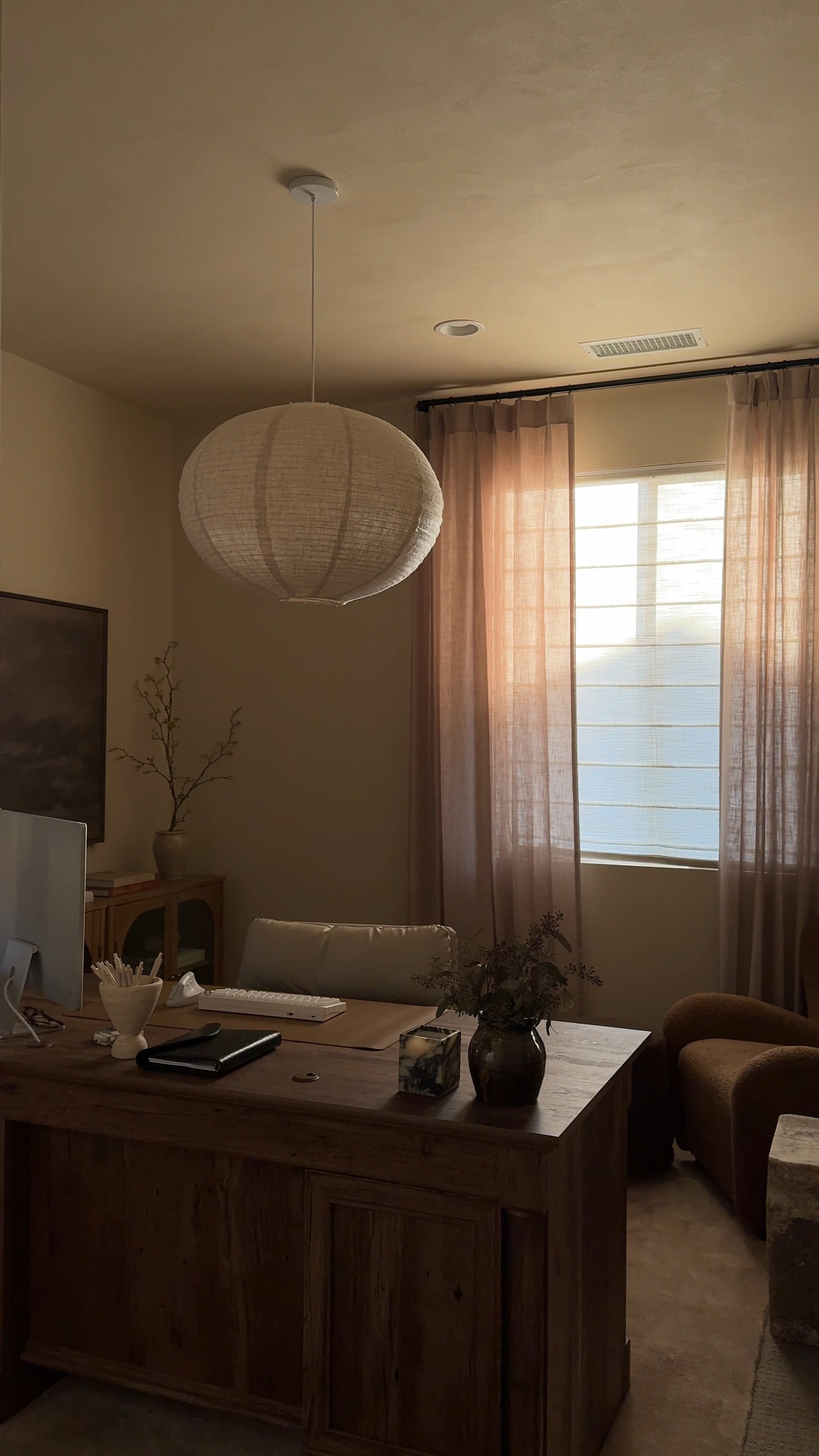 Office refresh details! 🤍 

- Paint color is Madison Blanche by Sherwin Williams 
- Linen globe light shade is from Zara Home but sold out so I linked similar!
- Roman Shades are from SelectBlinds in Rustic Americana (Country Beige)

#LTKHome