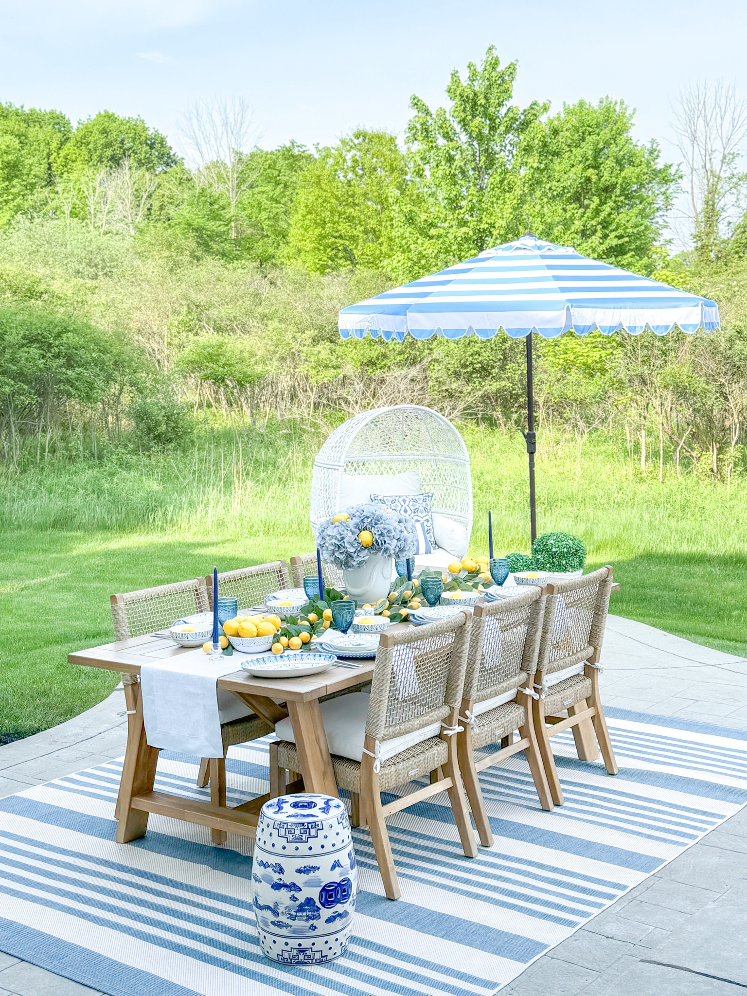 Shop my outdoor space! 

Blue and white decor, patio decor, outdoor decor, backyard goals, blue and white umbrella, teak outdoor table, outdoor rug, Safavieh, garden stool, Anduze planter, outdoor planter, egg chair, Walmart style, Walmart finds, boxwood ball

#LTKFindsUnder100 #LTKHome #LTKSaleAlert