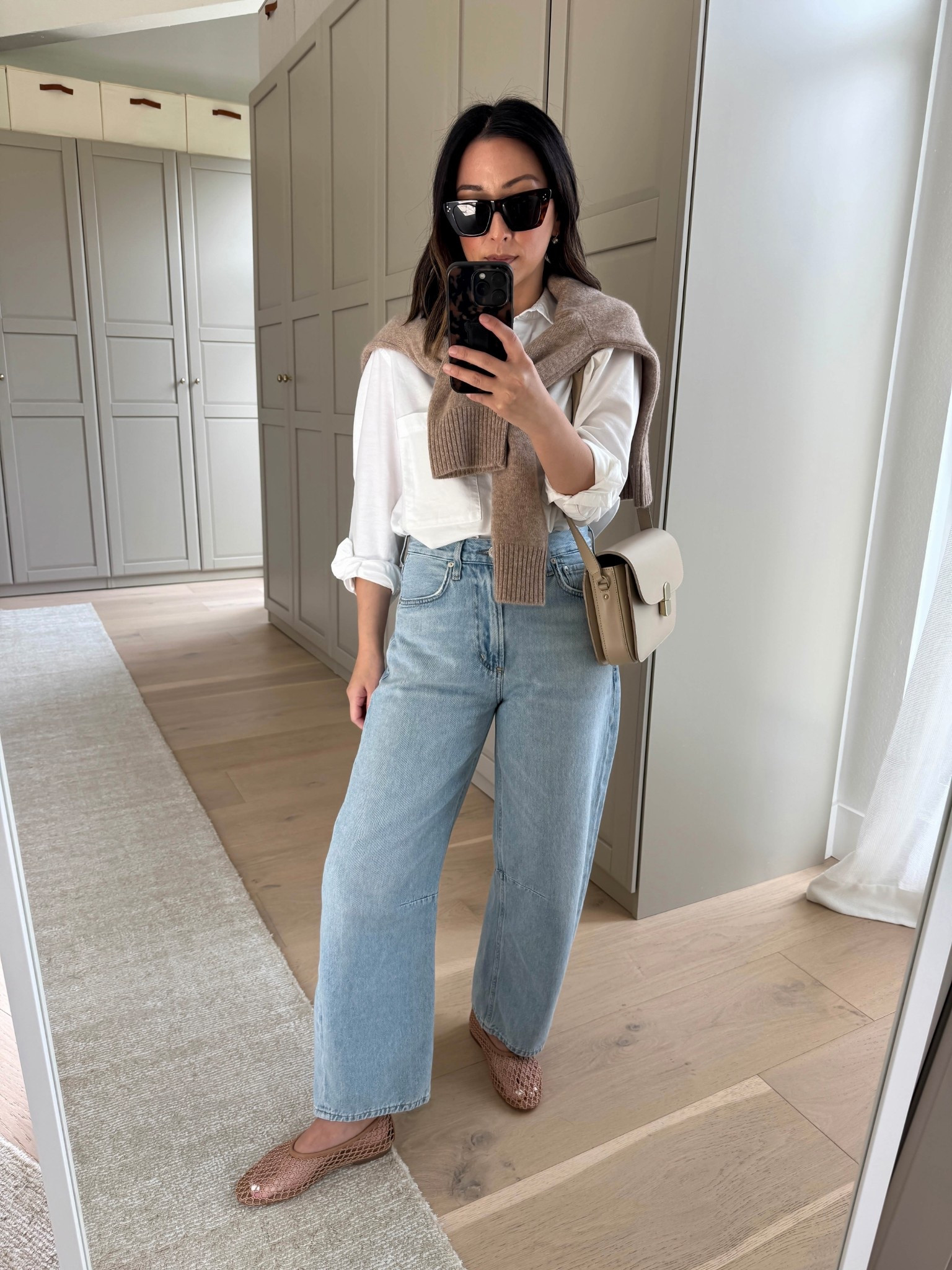 Finally!!!! Petite barrel jeans that actually fit us and I’m obsessed with. This specific wash is also very soft - like the sweatpants jeans. 

Petite miros fit smaller - more narrow legs and a slightly shorter rise. Because of this I went with my normal size up, 25. They were quite bit but after a wash and dry, they’re perfect!

AYR shirt xs
Citizens of humanity Miro jeans petite 25
Marc Fosher flats 5. Run big
Quince cashmere sweater xs
Sezane Milo bag - color is old, linked similar. 
Celine sunglasses 
Electric Picks earrings 
Dorsey James necklace 15"

Petite style, jeans, spring outfits 2026

#LTKootd #LTKPetite #LTKmomlife