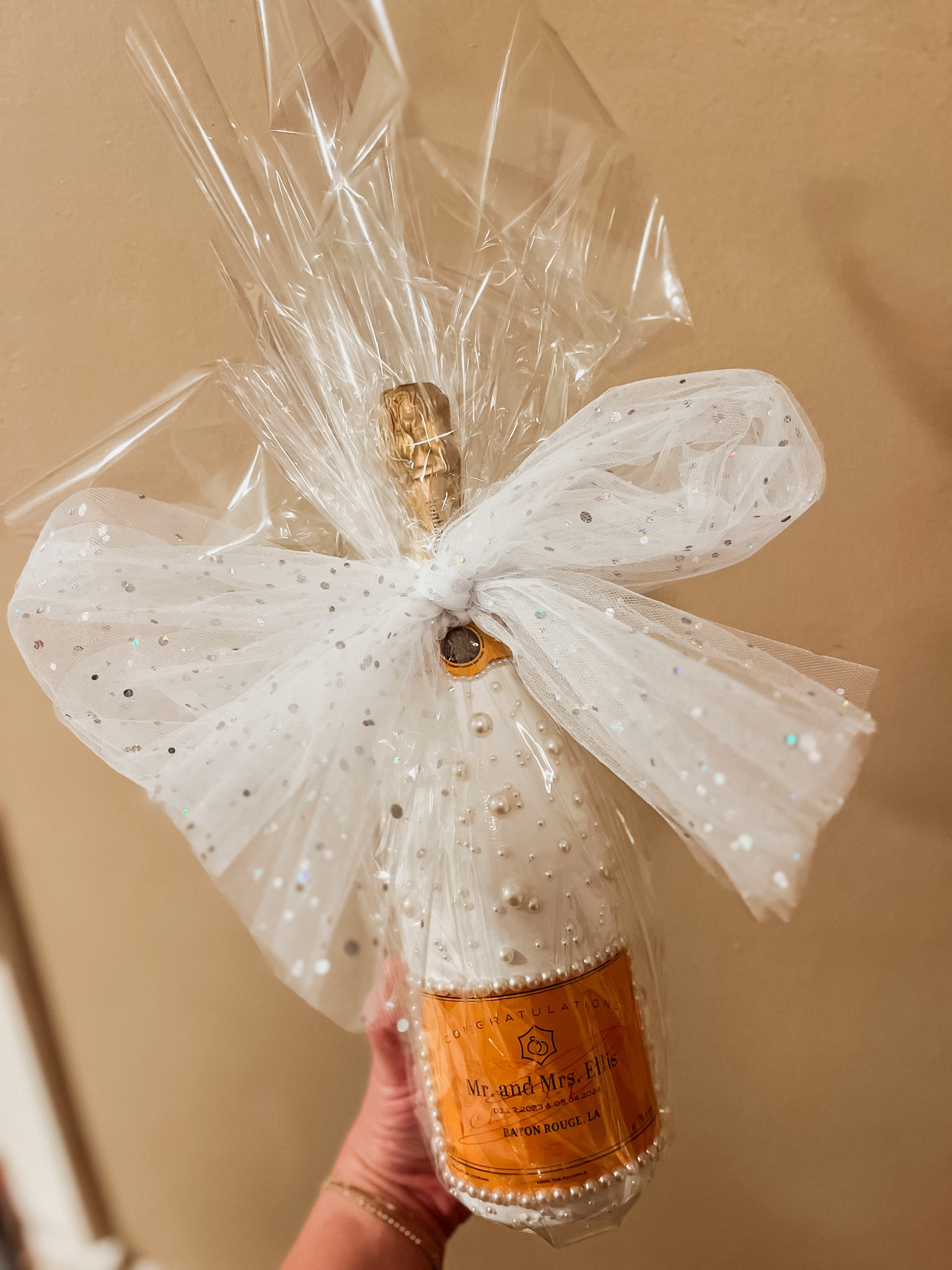 Elevate any champagne bottle with some paint & pearls!
..
Paint • Champagne Bottle • Veuve • Painted Champagne Bottle • Wedding Gift 
..


#LTKWedding #LTKFamily #LTKGiftGuide