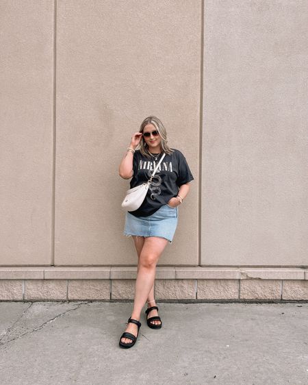 Casual midsize summer ootd - graphic tee (XL), denim mini skirt (14), Coach crossbody bag, black sandals
________

Midsize fashion, midsize style, spring to summer outfits, casual style, oversized graphic tee, how to wear a denim mini skirt
.
#LTKspring  #ltksummer #ltkmidsize

#LTKcanada #LTKmidsize #LTKsummer