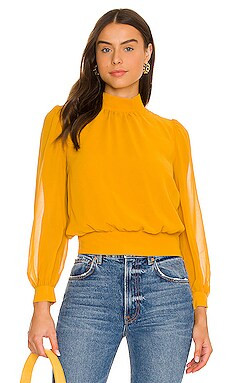 1. STATE Long Sleeve Mock Neck Top in Saffron from Revolve.com | Revolve Clothing (Global)
