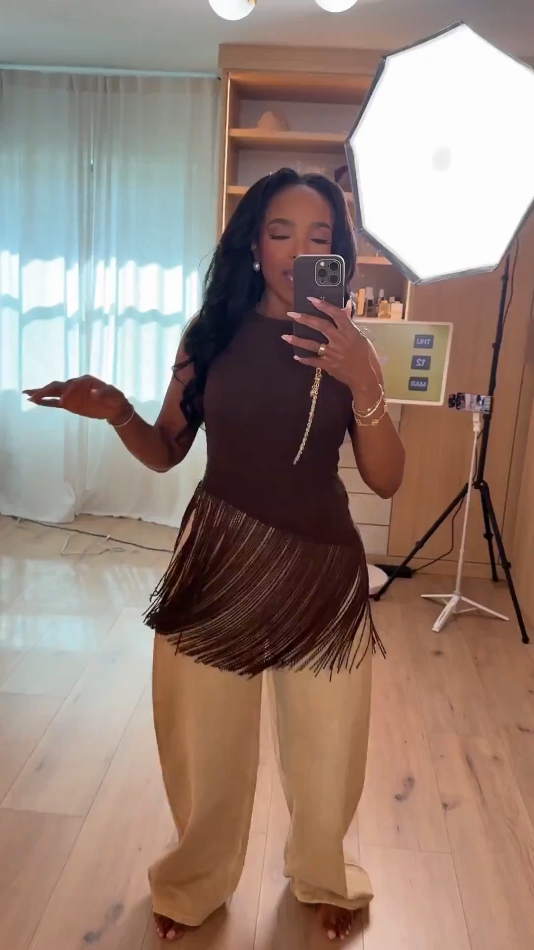 Scroll to shop!! This neutral outfit featuring a statement fringe top paired with relaxed wide-leg trousers is perfect for dinner plans, date nights, vacation outfits, or an elevated casual look.



#LTKPetite #LTKSaleAlert #LTKootd